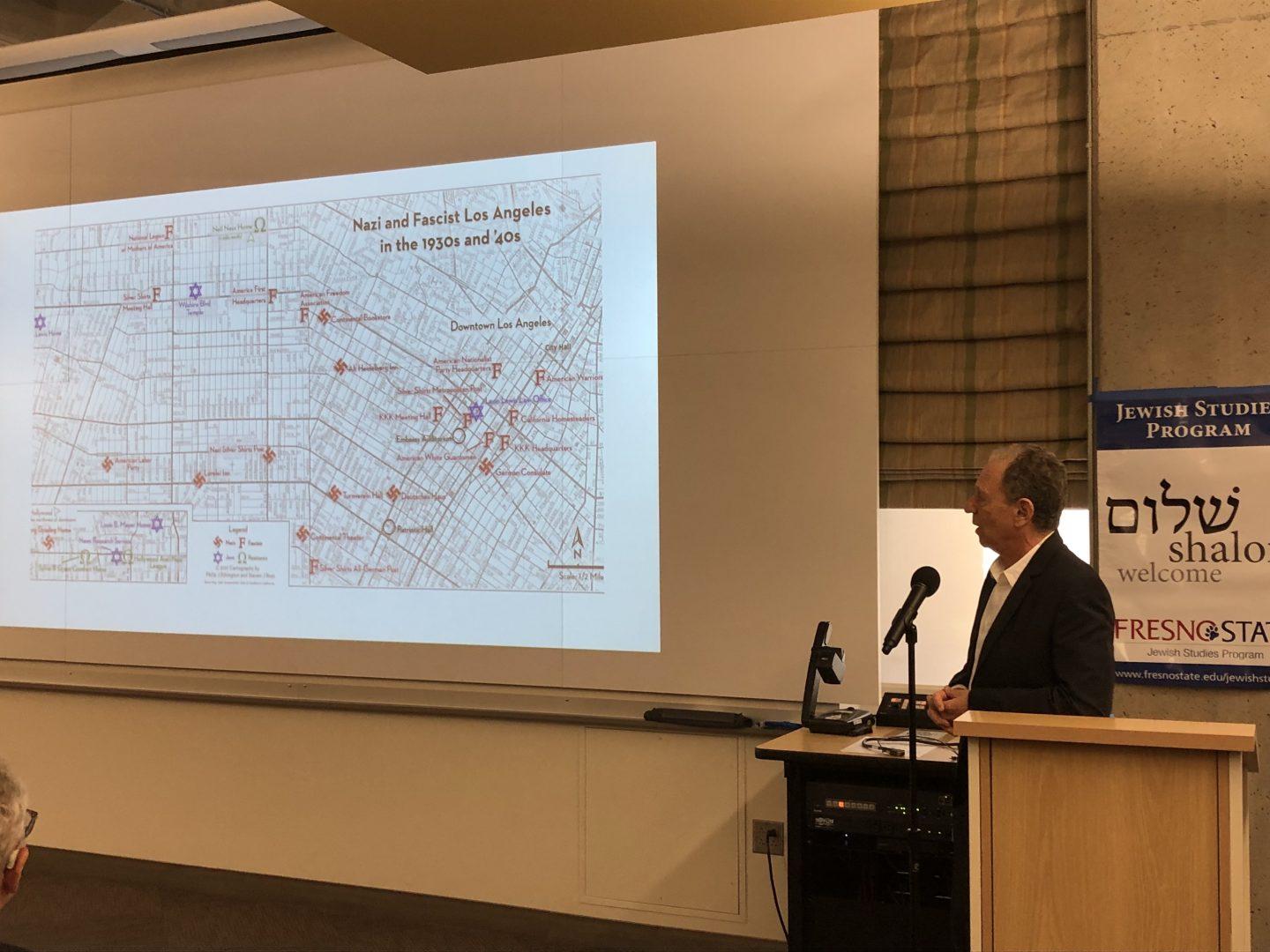 Dr. Steven J. Ross, professor of history at USC, presents a map of Nazi & Facist groups found in Los Angeles. Ross gave a history lecture in the Henry Madden Library on April 12, 2018.  (William Ramirez/The Collegian) 