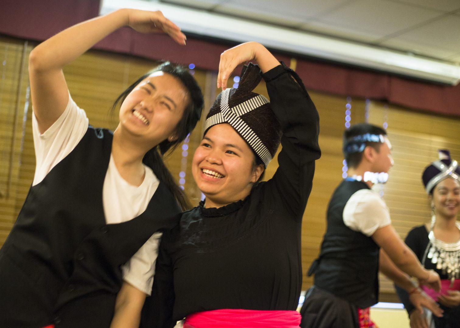Hmong Student Association members Pazao Lor and Sandy Vang perform their dance during the Amererasia Culture Show in the Vintage Room on April 5, 2018. (Ramuel Reyes/The Collegian)