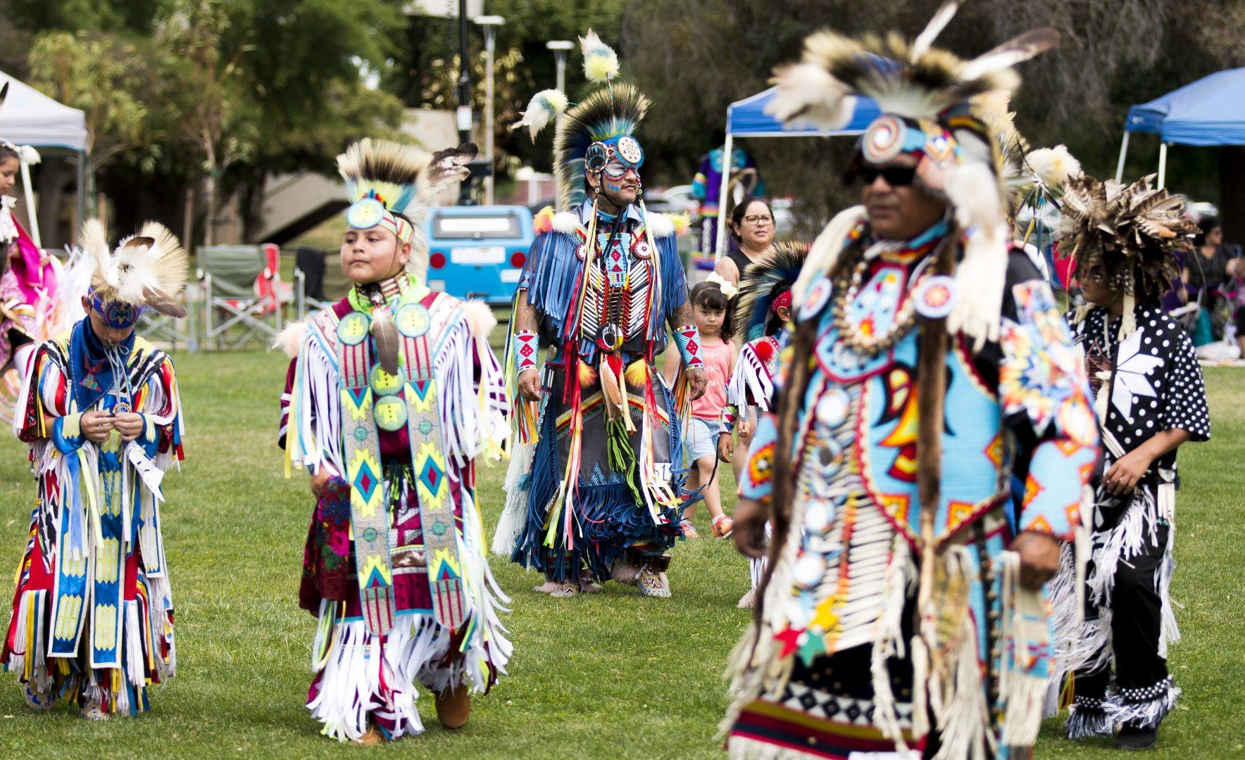 Tribe members dance during the “We Are Still Here” Powwow; the three-day event was celebrated at Fresno State’s Maple Mall from May 4 to May 6, 2018. (Jorge Rodriguez/The Collegian)