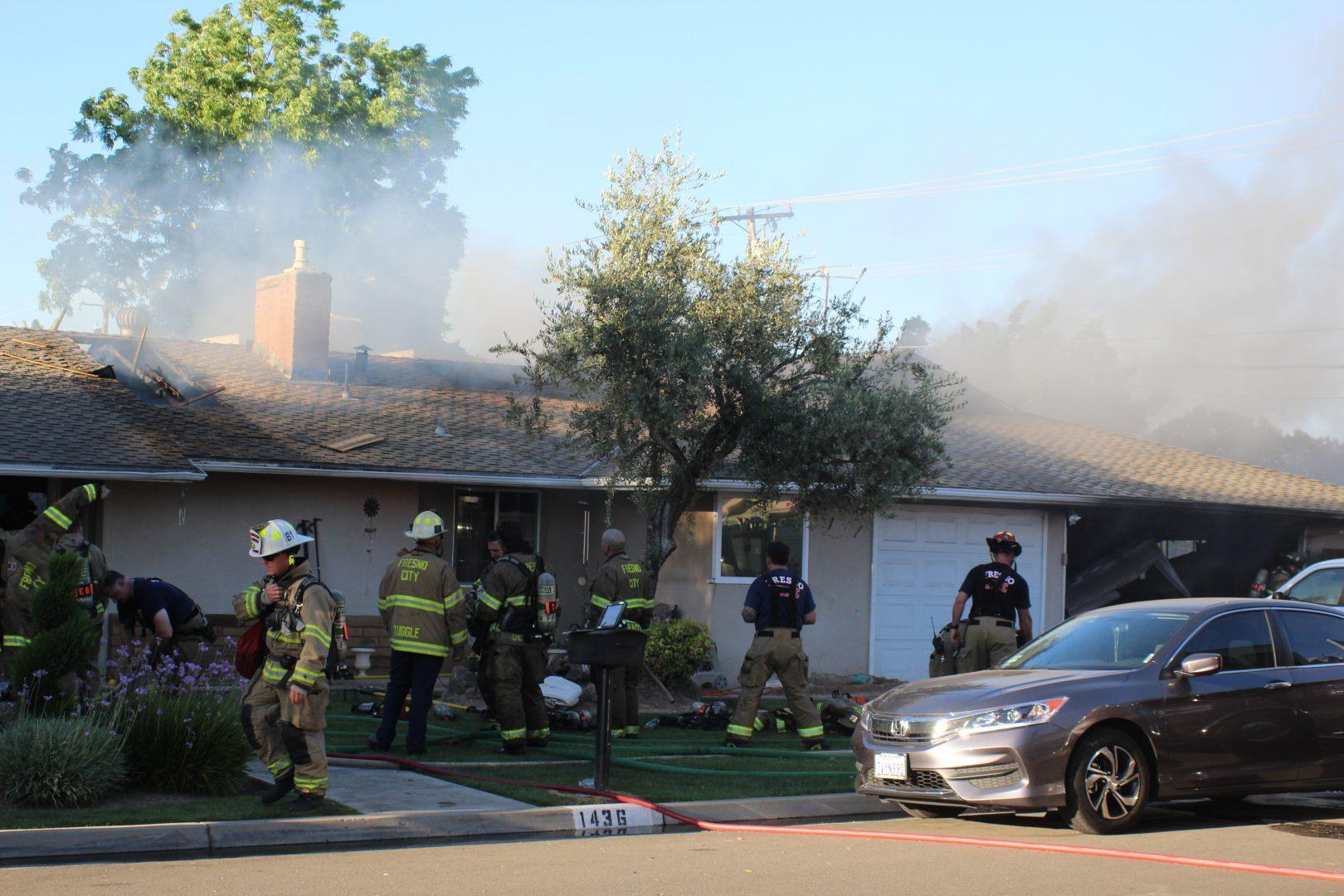 A home was damaged by flames on June 4, 2018 west of Fresno State. (Dan Waterhouse/The Collegian)