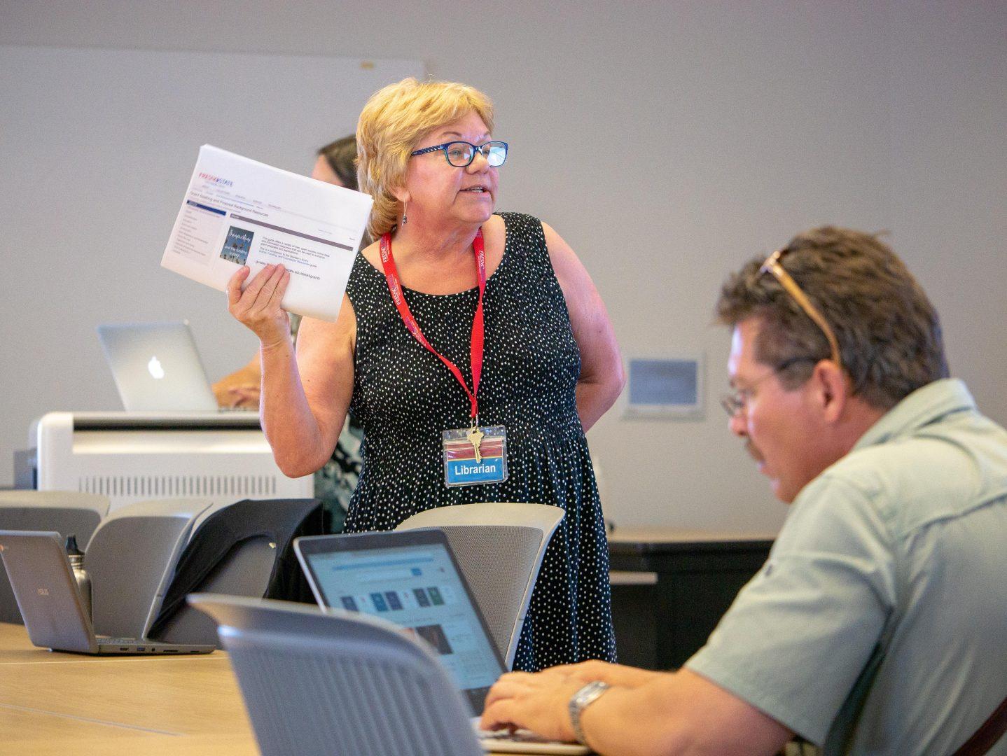Fresno State librarian Jane Magee shows resources to attendees at a July 19 workshop. Magee was part of a team presenting on a new funding database that is now available to faculty, students and the community at the Henry Madden Library (photo courtesy of the Henry Madden Library).