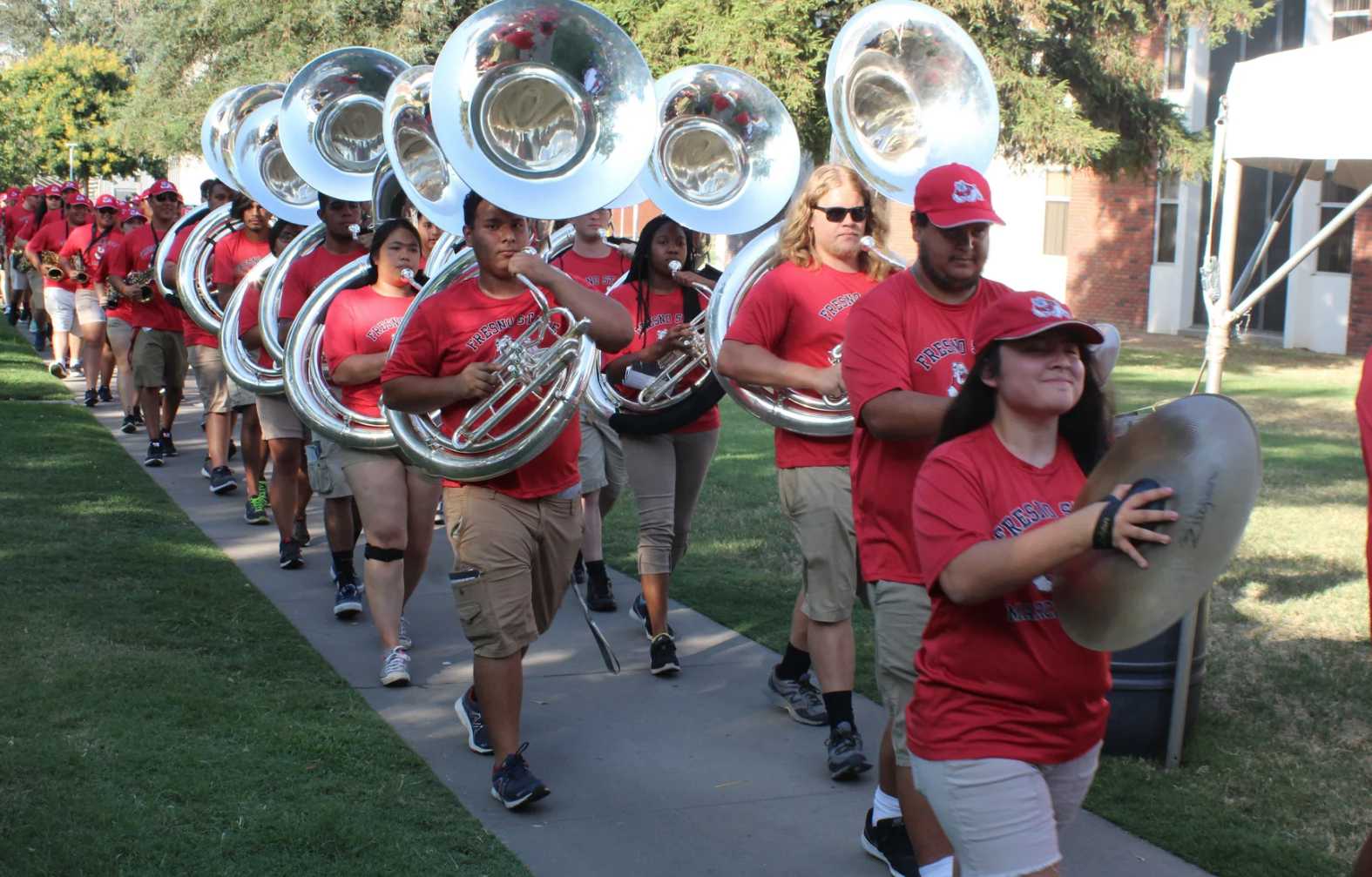 The tubas come marching in. The Bulldog Marching Band at the residence halls Move-In Day barbeque on Sunday. Photo by Dan Waterhouse/The Collegian.