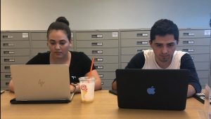 Fresno State students Jorge Lopez and Lisette Rodriguez focus on school work on a recent day. Photo by Marilyn Castaneda/The Collegian