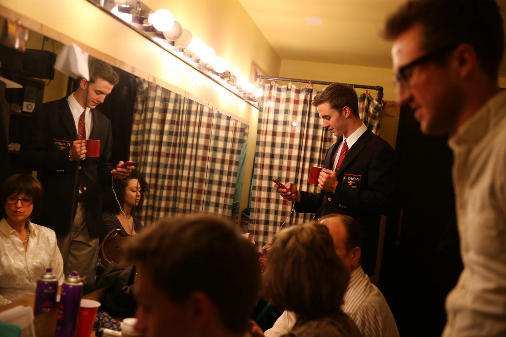 Will Kiley checks his phone while waiting to take the stage in 2014. (Chris Sweda/Chicago Tribune/TNS)