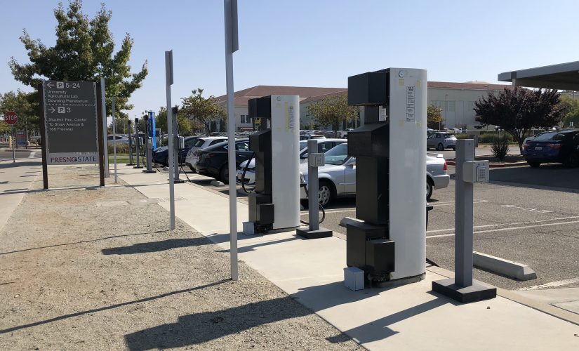 There are currently two fast-charging stations and four slower-charging stations for electric vehicles located in Parking Lot P2 at Fresno State. (Marilyn Castaneda/The Collegian)