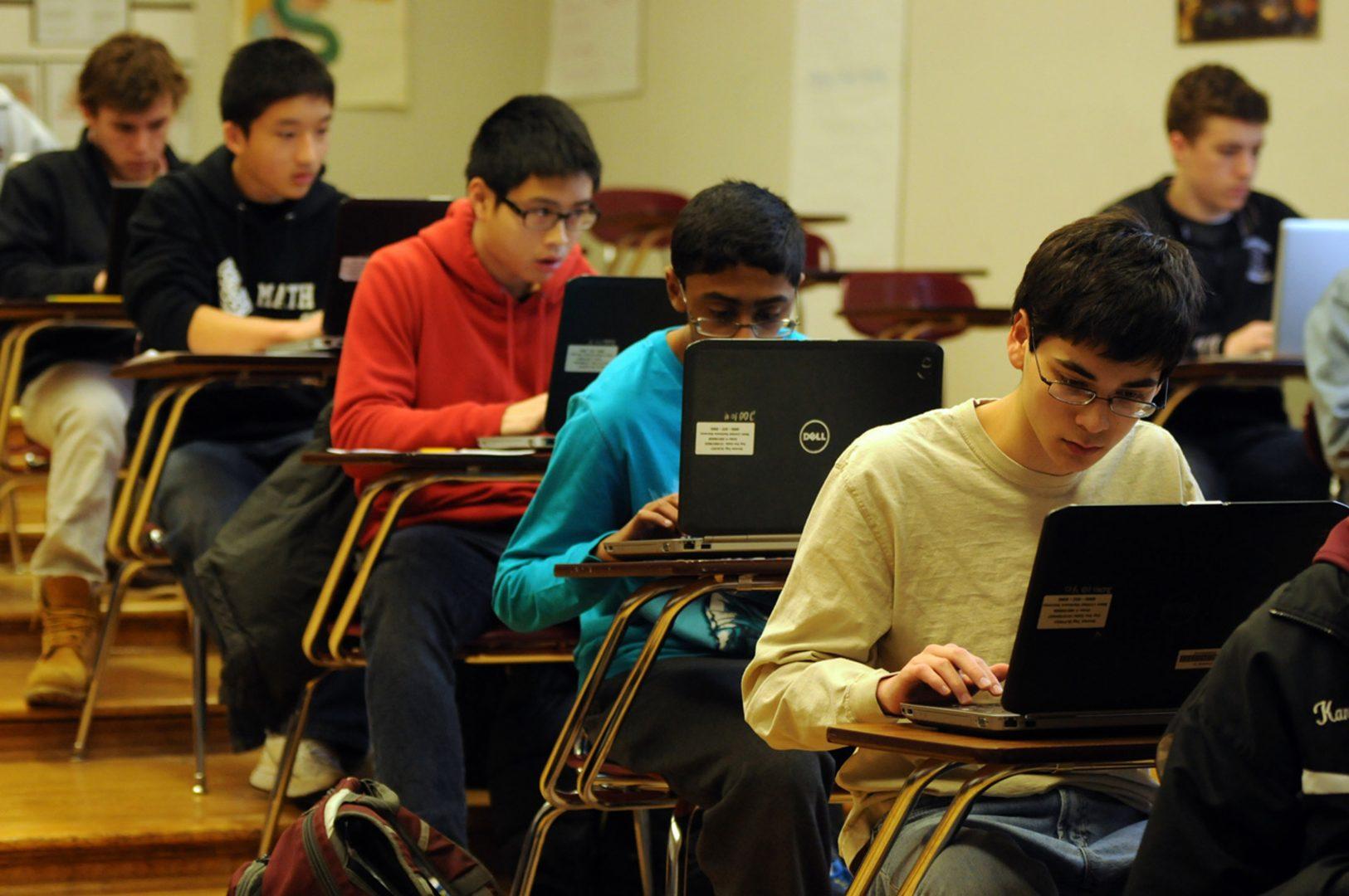 Students use laptops while taking a Latin honors exam at Ridgewood High School, January 25, 2013, in Ridgewood, New Jersey. (Tribune News Service)