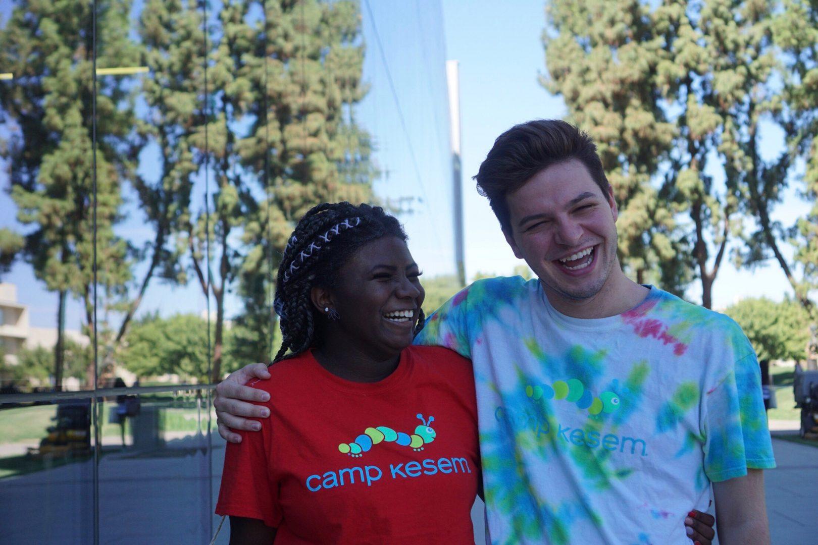 Fresno+State+students+Keyana+Washington+and+Christopher+Rodriguez+who+both+volunteer+their+time+at+Camp+Kesem%2C+a+weeklong+retreat+for+children+whose+parents+have+been+affected+by+cancer%2C+stand+outside+the+Henry+Madden+Library.+%28Contributed%29
