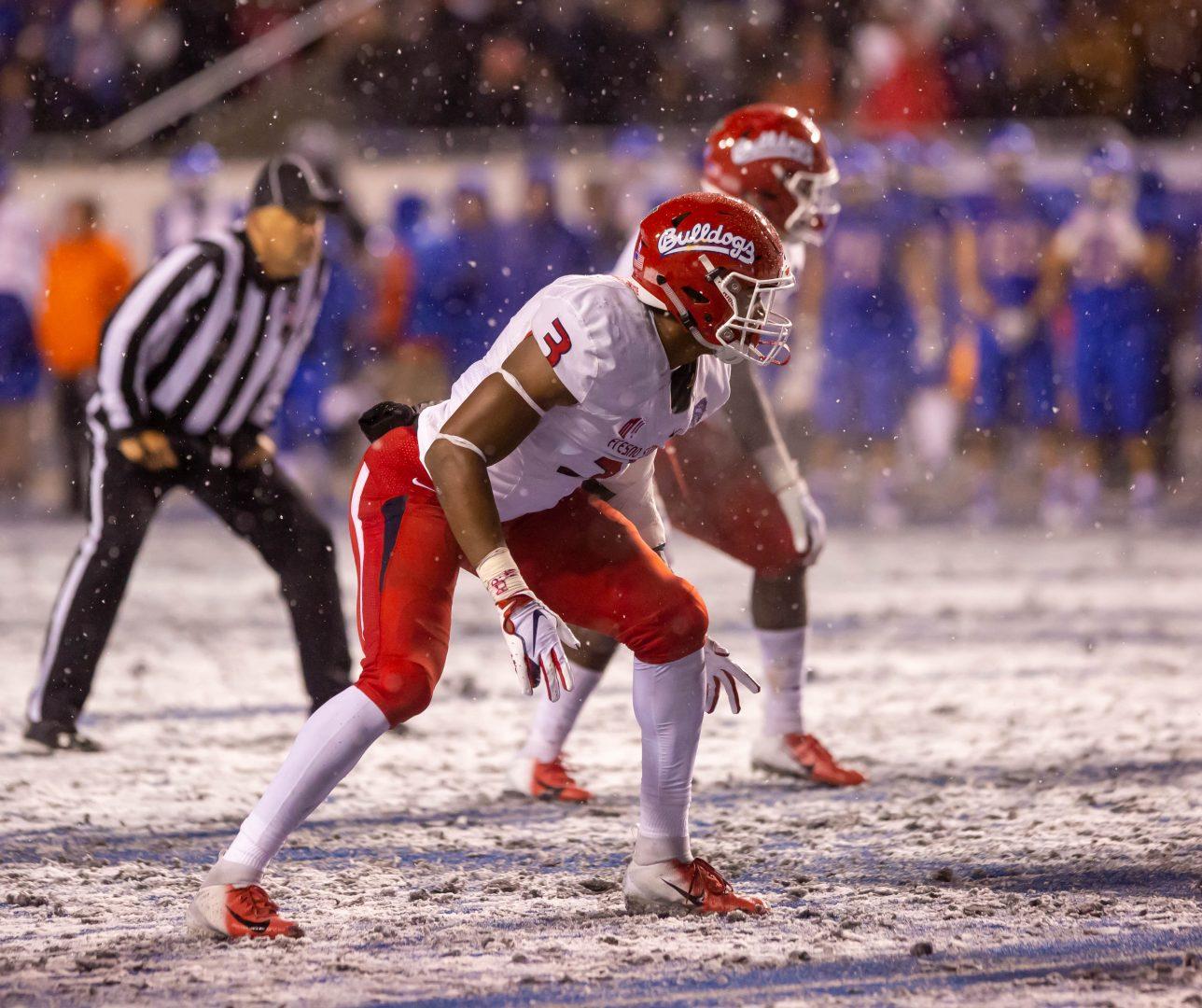 Fresno State defensive end Mykal Walker lines up before a play in the Bulldogs 19-16 victory over Boise State in the Mountain West championship game on Dec. 1, 2018. (Jose Romo/The Collegian)