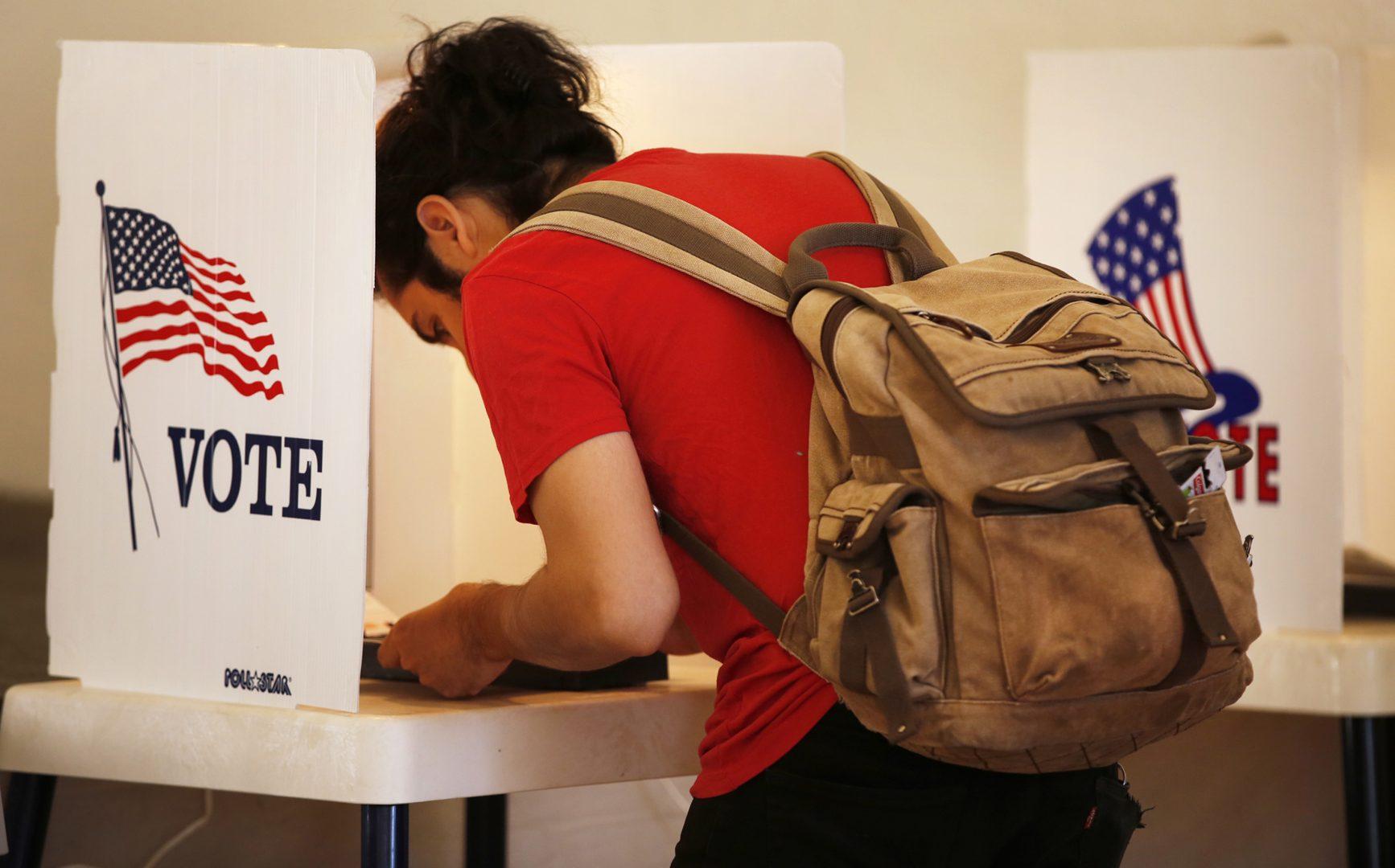 A voter heads to the polls in an April 2017 file image. In Maine, for the first time in U.S. history, a controversial voting system known as ranked choice is being used to decide a federal election. (Al Seib/Los Angeles Times/TNS)