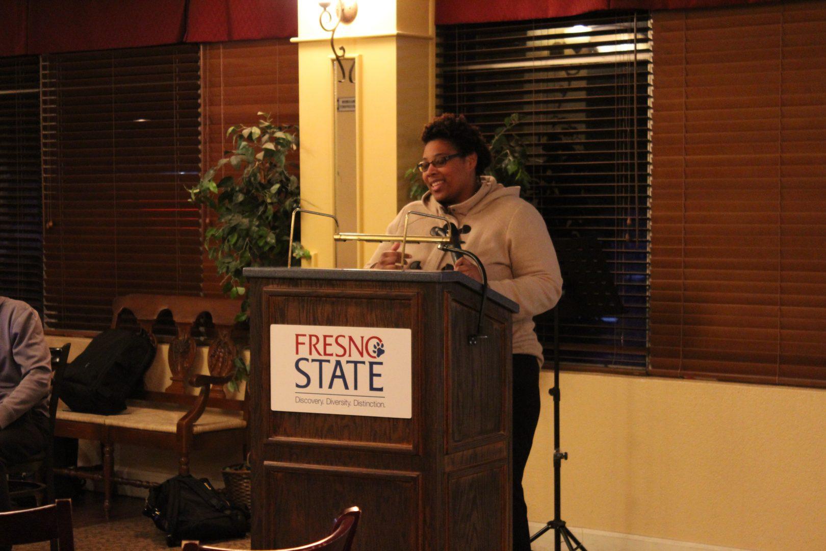 Local author and poet Jaie Noelle reads her poem titled Blind Spots at the Cross Cultural Programs and Services monthly poetry jam on Feb. 20. (Paige Gibbs/The Collegian)
