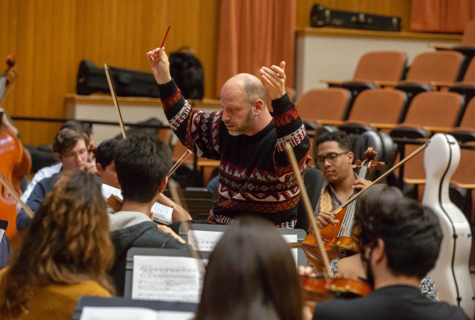 Fresno State professor and conductor Dr. Thomas Loewenheim, the Fresno State Symphony Orchestra, and the Opera Theatre practice for Madama Butterfly at the Fresno State Concert Hall on Monday, Feb. 25, 2019. (Jose Romo Jr./The Collegian). 