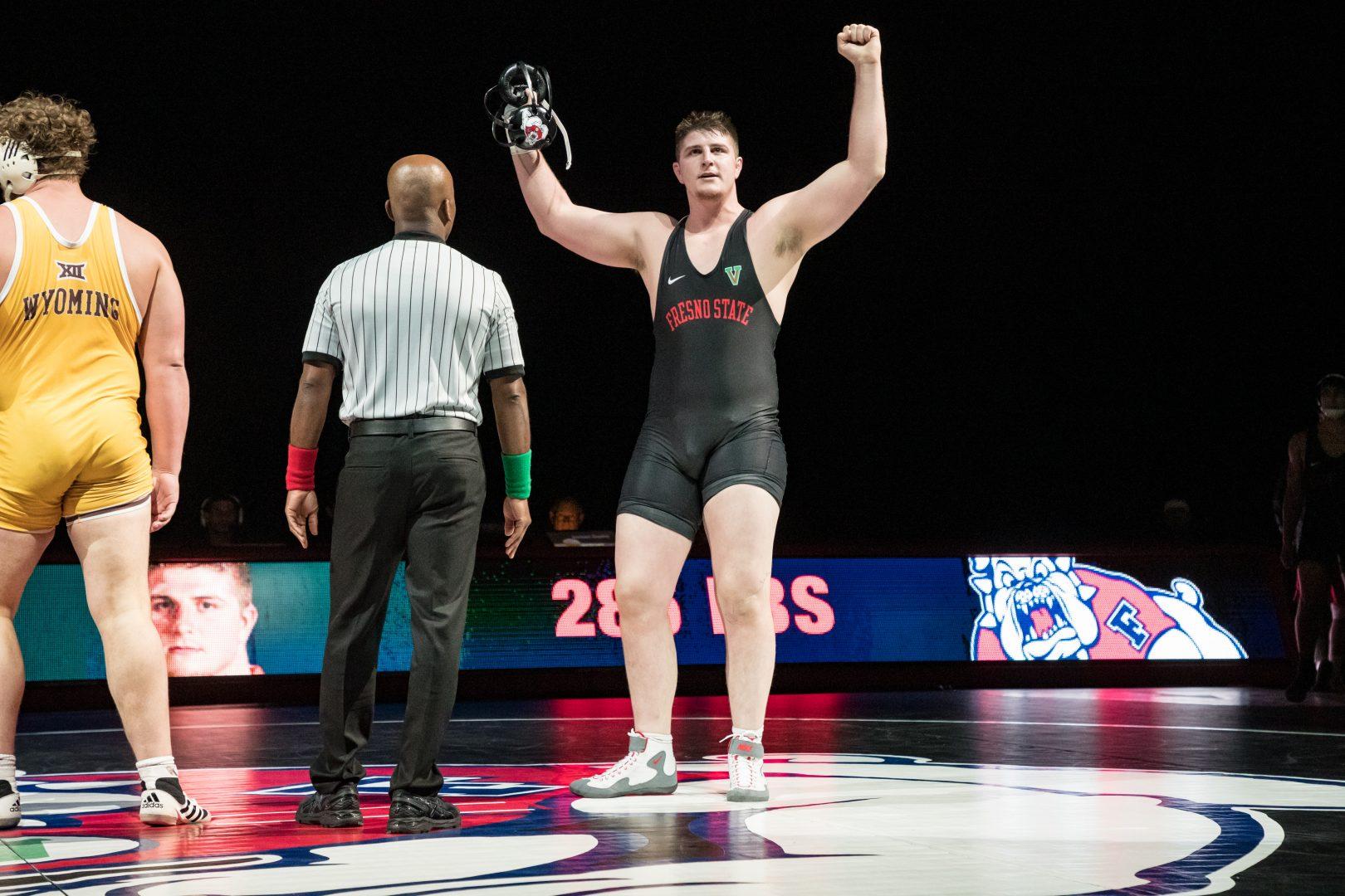 Fresno State wrestler AJ Nevills celebrates a victory in his match in a dual at home against No. 11 ranked Wyoming, Feb. 3, 2019. (Keith Kountz/Fresno State Athletics)