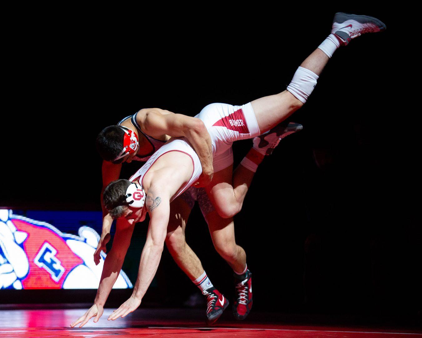 Fresno State’s Jacob Wright attempts to take down Oklahoma’s Justin Thomas during
the Bulldogs’ duel lost at the Save Mart Center on Sunday, Feb. 17, 2019. (Jose Romo Jr./The
Collegian).