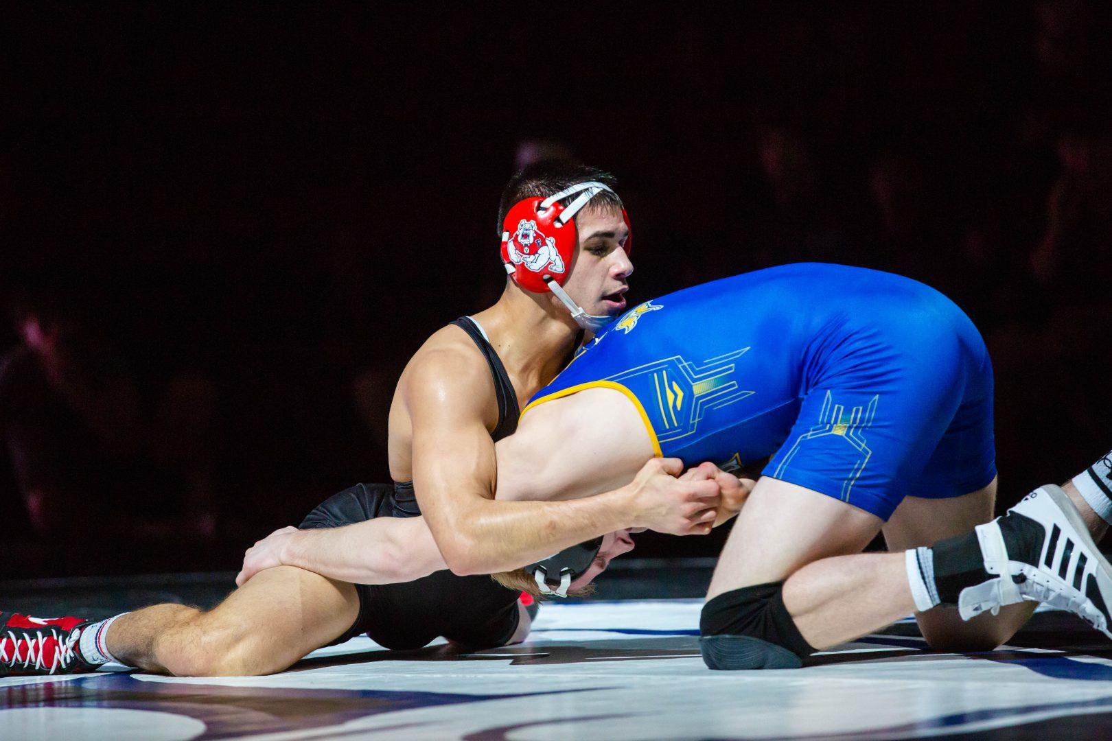 Fresno State’s Jacob Wright, one of the three wrestlers honored, defends a takedown attempt during the Bulldogs’ victory
over South Dakota State at the Save Mart Center on Jan. 20 th , 2019. (Jose Romo Jr./The
Collegian).