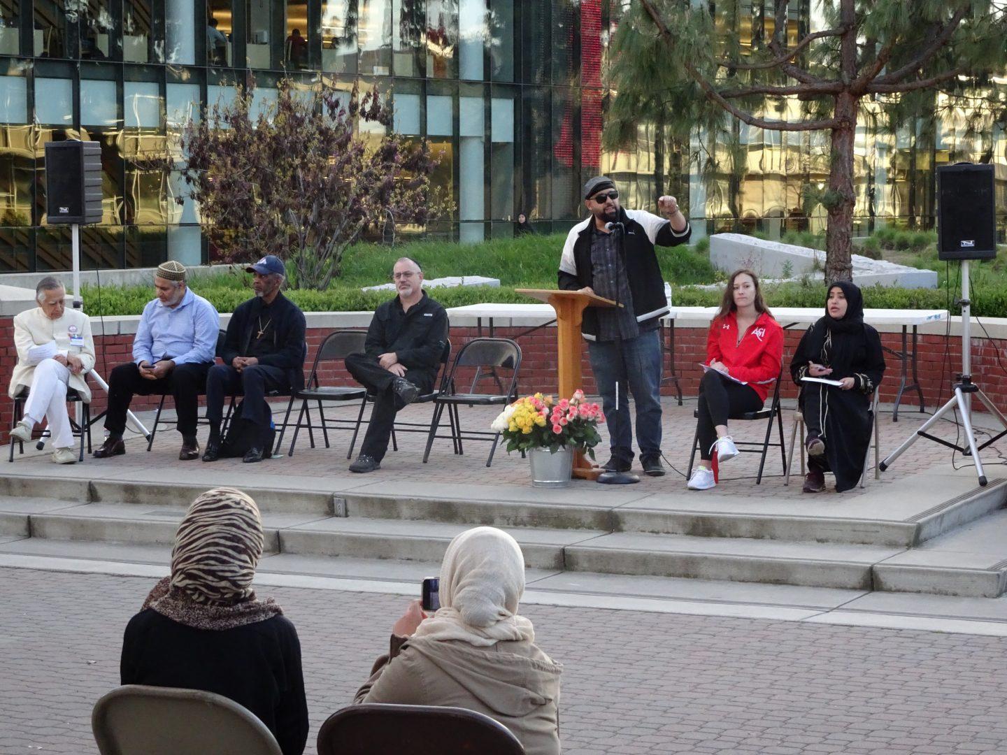 Hajj Reza Nekumanesh, executive director of the Islamic Cultural Center of Fresno, speaks at Fresno State on March 21 to attendees of a vigil held for the victims of the New Zealand mosque terror attack on March 15. (Jorge Rodriguez/The Collegian)