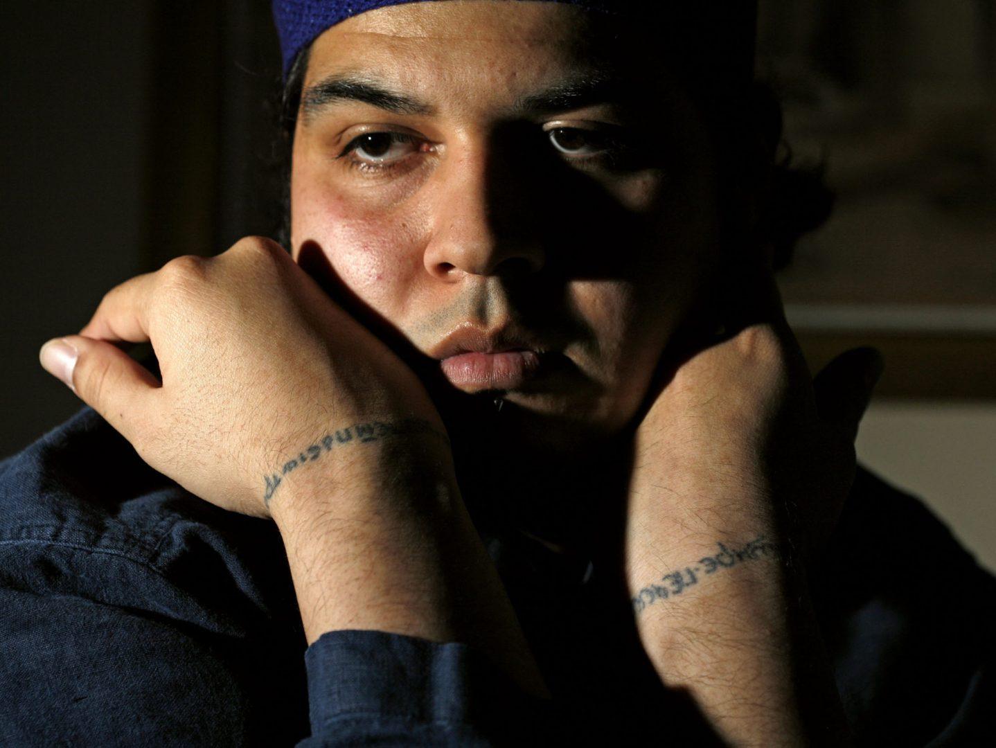 Ameni Rangel, pictured January 26, 2007, says he was fired from Red Robin Restaurant in Bellevue, Washington, after refusing to cover a religious inscription tattooed on his wrists. (Betty Udesen/Seattle Times/MCT)