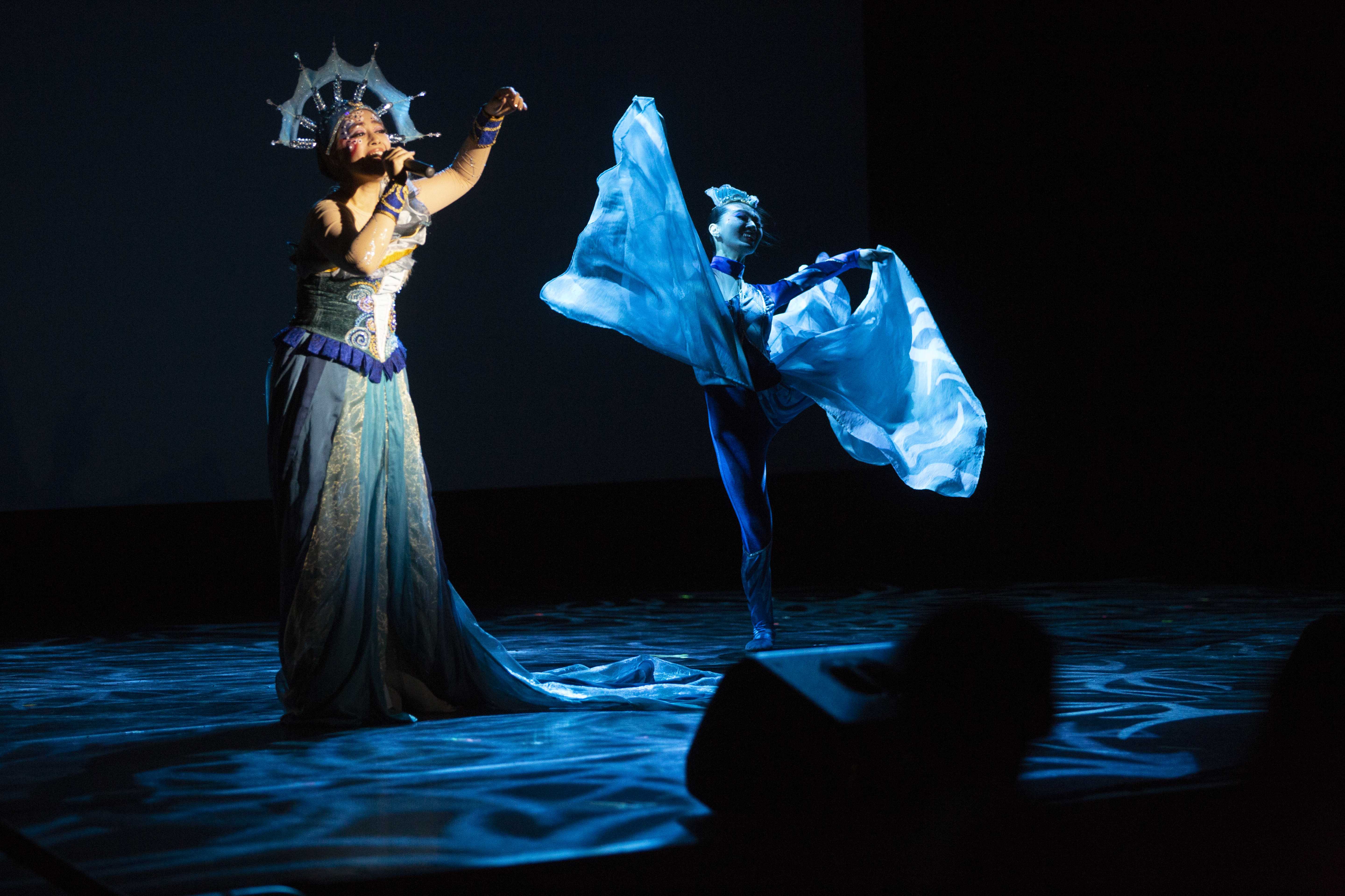 Singer Usay Kawlu and ballerina Lin yi Jiun perform a song and dance number during the first act of the “Ocean Celebration” put on by the Diabolo Dance Theatre at the Satellite Student Union on Friday, Sept. 13, 2019. (Larry Valenzuela/ The Collegian)