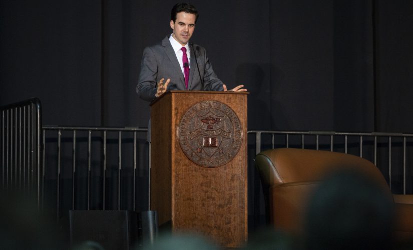 Political reporter Robert Costa speaks to a crowd during his discussion as part of the Presidents Lecture Series at the Save Mart Center on Tuesday, Oct. 1, 2019. (Larry Valenzuela/The Collegian)