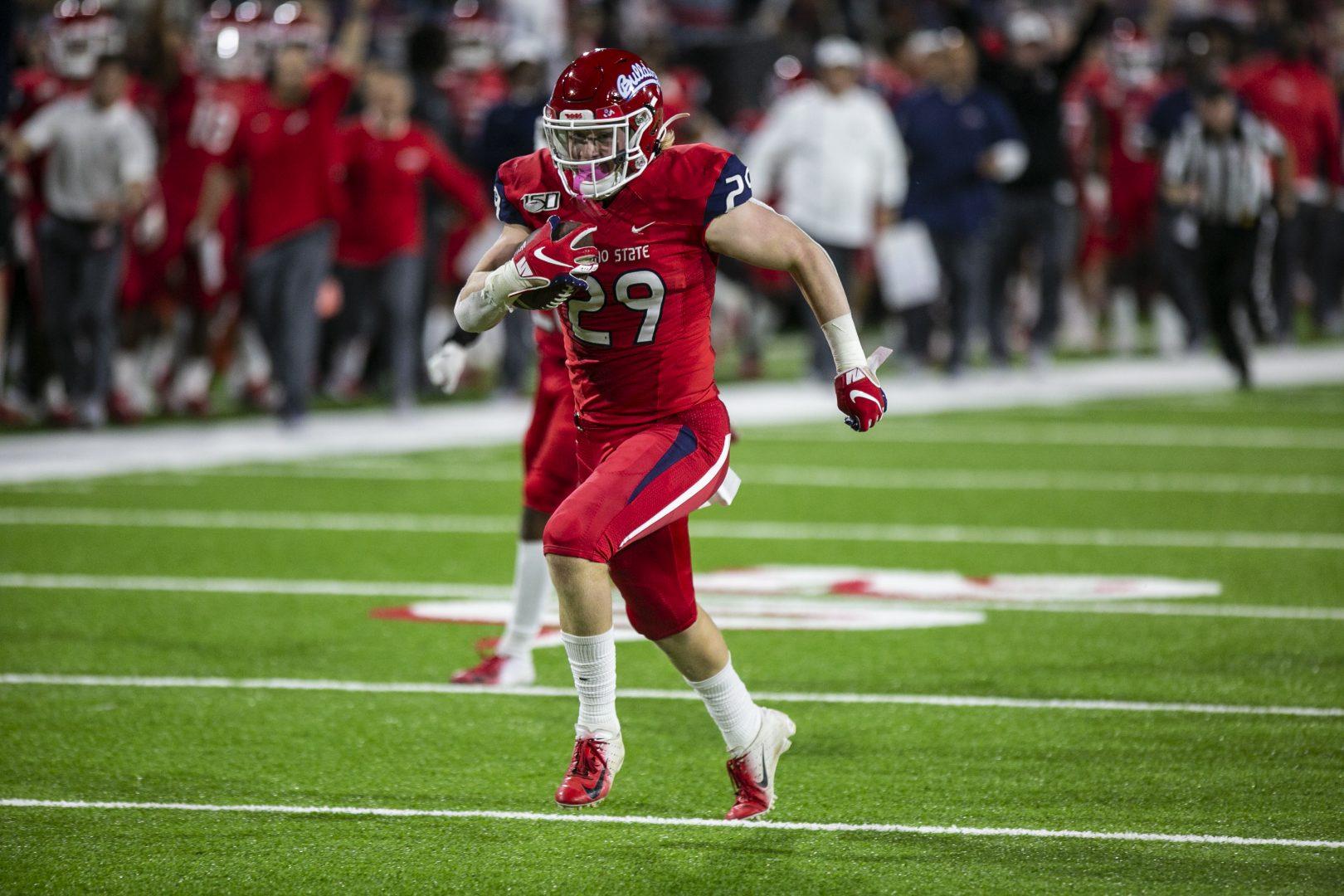 Fresno State linebacker Justin Rice recovers and scores a touchdown during a home victory against the University of Nevada Las Vegas at Bulldog Stadium on Friday, Oct. 18, 2019. (Larry Valenzuela/The Collegian)