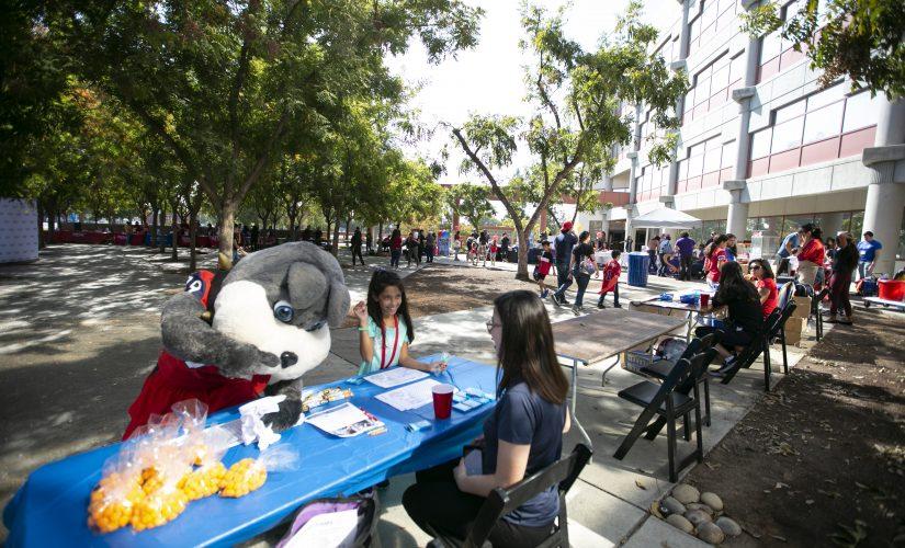 The Kremen School of Education and Human-Development host their first open house in front of the Education Building for Homecoming on Saturday, Oct. 26, 2019. (Larry Valenzuela/The Collegian)