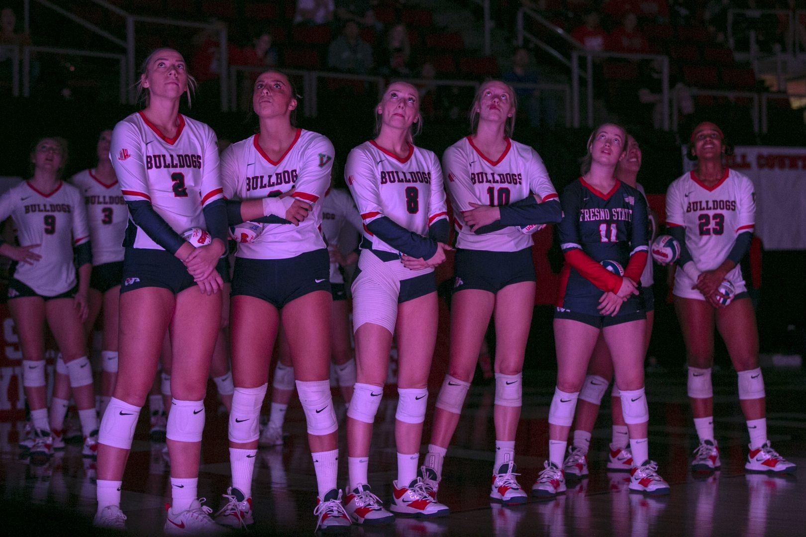 Fresno State volleyball team looking at the pre-match video during their last home match of the season at the Save Mart Center on Saturday, Nov. 16, 2019. (Jorge Rodriguez/The Collegian)