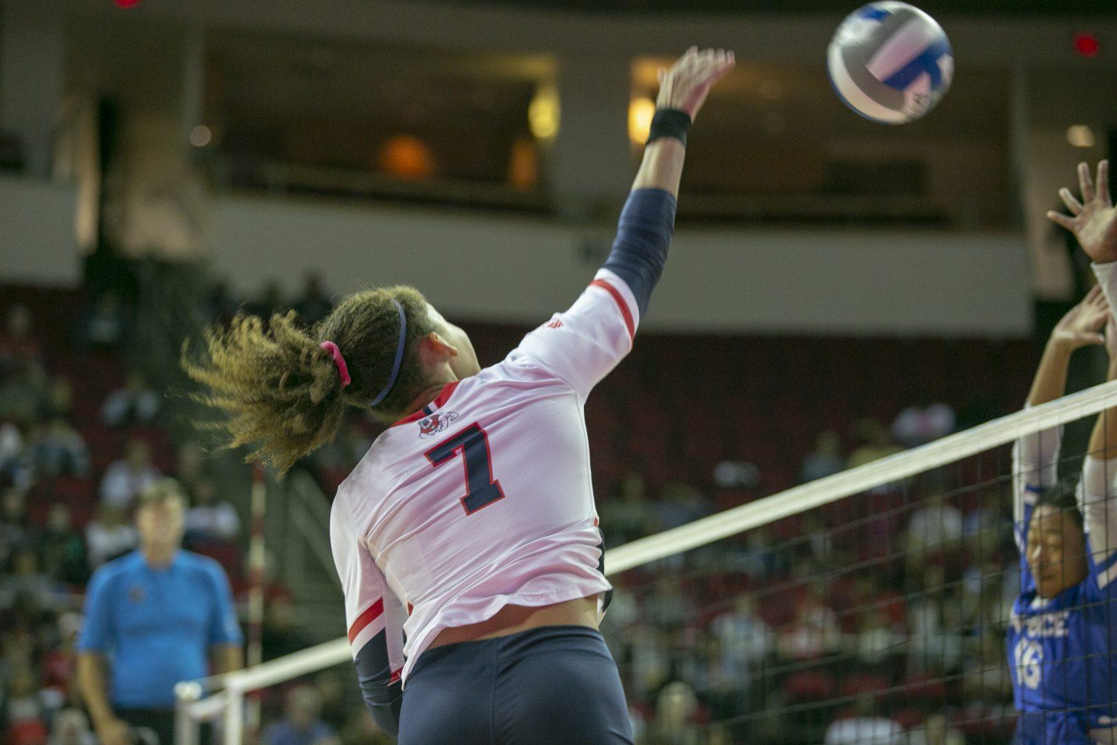 Fresno State outside hitter Amaria Kelley tries to get the ball pass the Air Force defenders during a home match at the Save Mart Center on Saturday, Nov. 16, 2019. (Jorge Rodriguez/ The Collegian)
