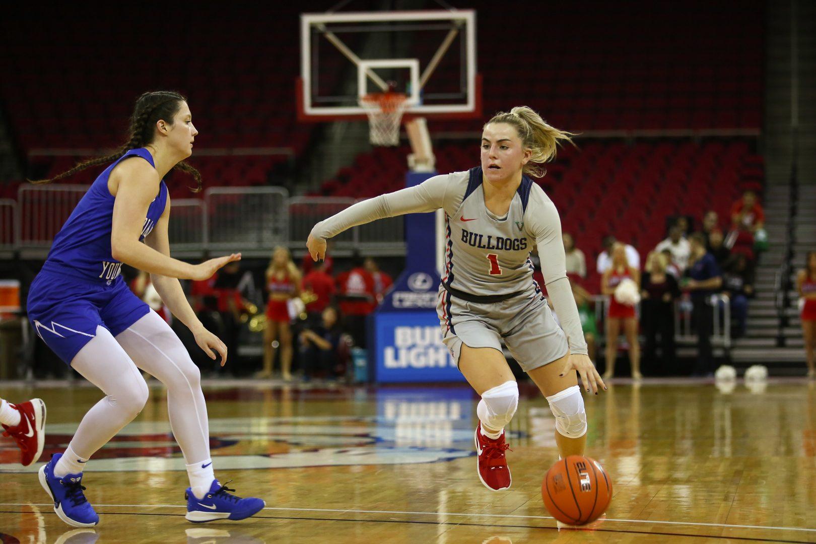 Fresno State guard Haley Cavinder drives the ball to the basket during a home game loss against BYU at the SaveMart Center on Thursday November 21, 2019. (Armando Carreno/The Collegian) 
