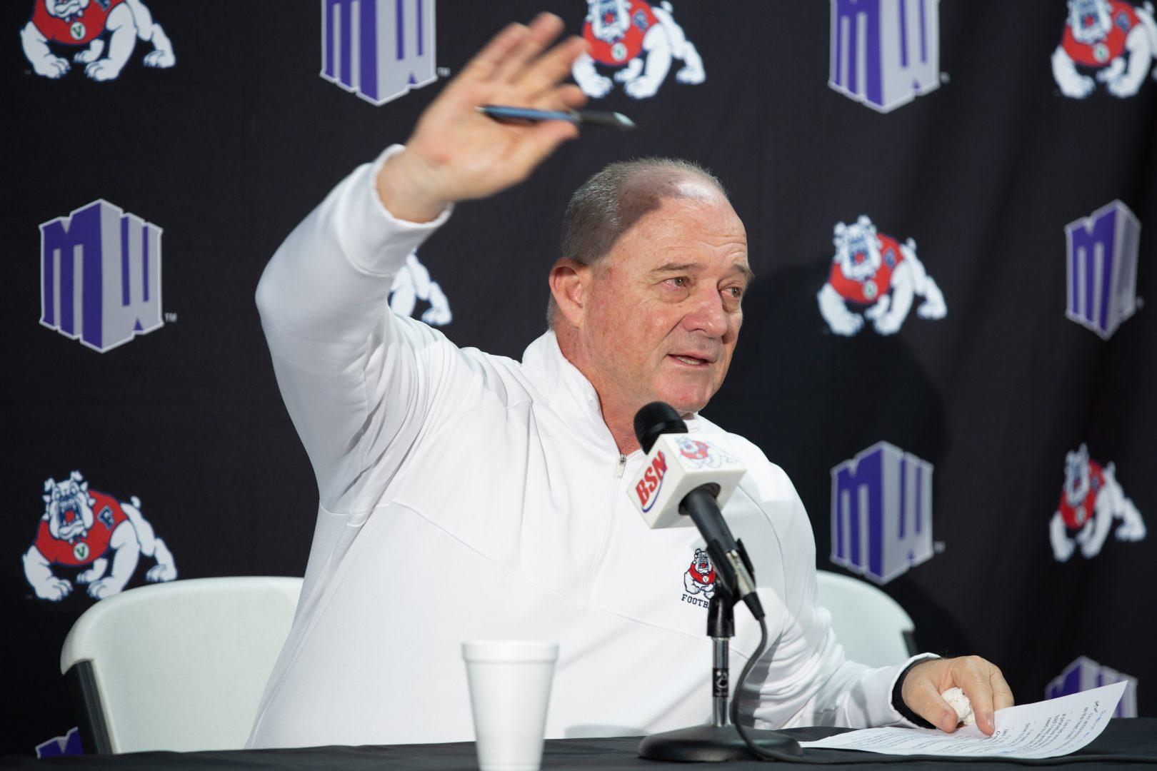 Jeff Tedford former Fresno State football head coach waves goodbye to those in attendance at his resignation press conference on Friday, Dec. 6, 2019. (Armando Carreno/The Collegian)