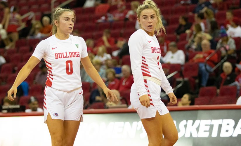 Fresno State guards Hanna Cavinder (left) and Haley Cavinder (right) during a home match celebrated at the Save Mart Center.  (Armando Carreno/The Collegian)