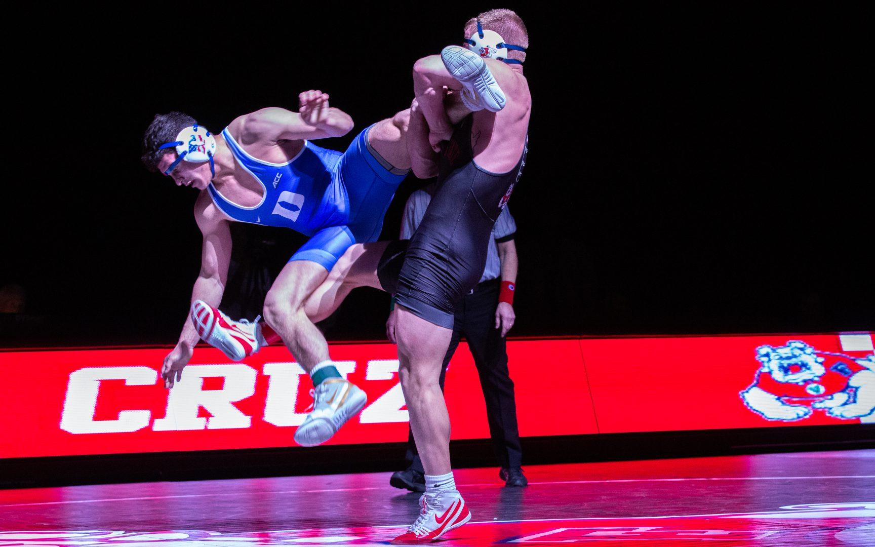 Redshirt Freshman Hunter Cruz goes for the take down at a wrestling match at the Savemart Center on Jan. 17, 2020. (Armando Carreno/The Collegian)
