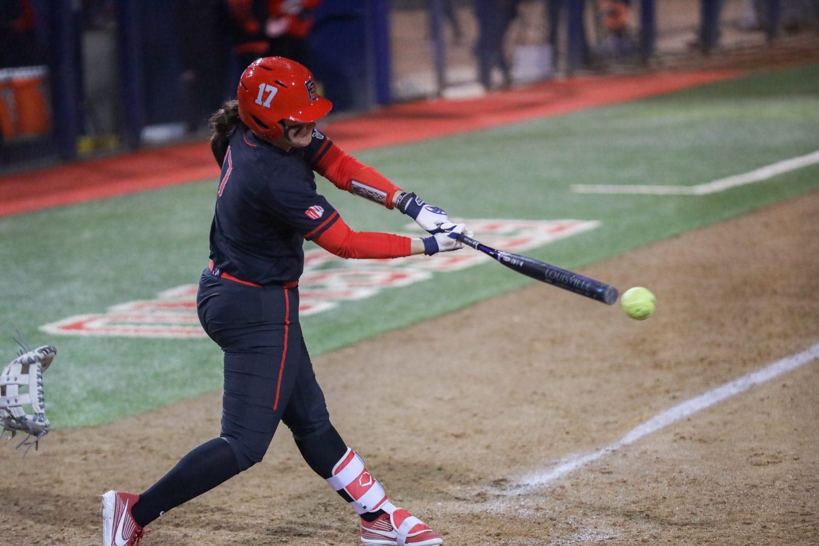 Fresno State catcher Kelcey Carrasco strikes the ball while batting during the Bulldog’s 13-1 victory over Cal Poly at Margie Wright Diamond on Feb. 15, 2020. (Vendila Yang/The Collegian)