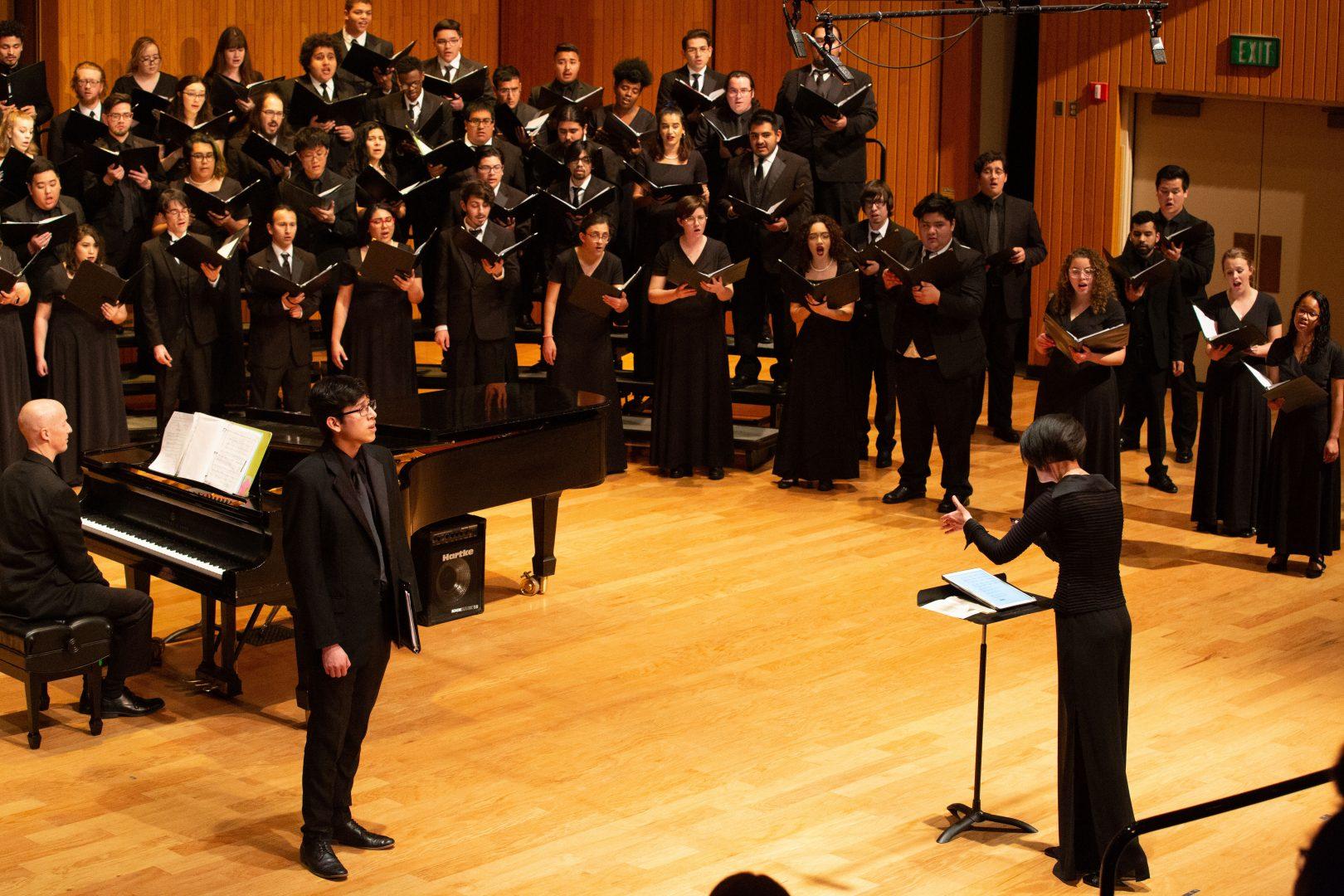Fresno State director Cari Earnhart conducts Fresno State’s and Fresno City College choir at the Concert Hall at Fresno State on Firday Feb. 7, 2020
 By: Armando Carreno