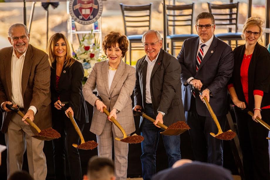 Lynda and Stewart Resnick breaking ground with their shovels at the construction site of the Lynda and Stewart Resnick Student Union Groundbreaking Ceremony at Fresno State on Thursday Feb. 20, 2020. (Armando Carreno/The Collegian)