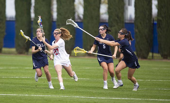 Hennessey Evans passes the ball in a lacrosse match against Yale on Thursday, March 12, 2020. Fresno State athletics announce the cancellation of all spring sporting events indefinitely earlier Thursday.