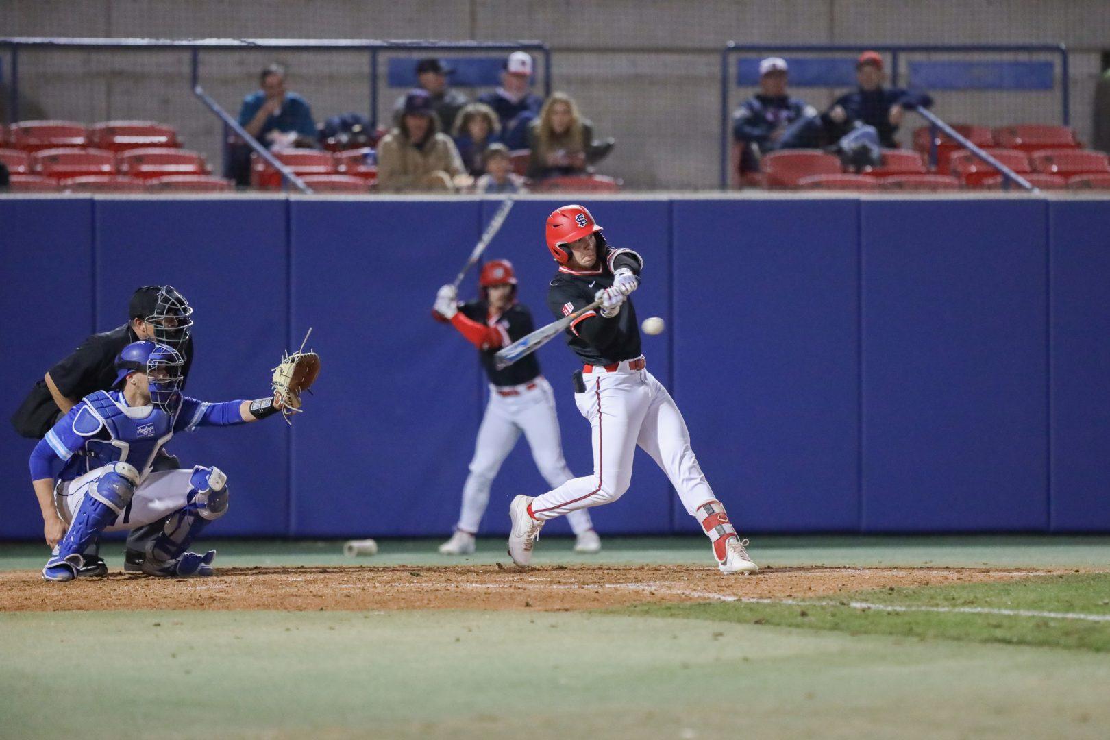 Infielder Ryan Higgins hits a home run in the bottom of the second against Seton Hall at Bob Bennett Stadium on Tuesday, March 3, 2020. (Vendila Yang/ The Collegian)