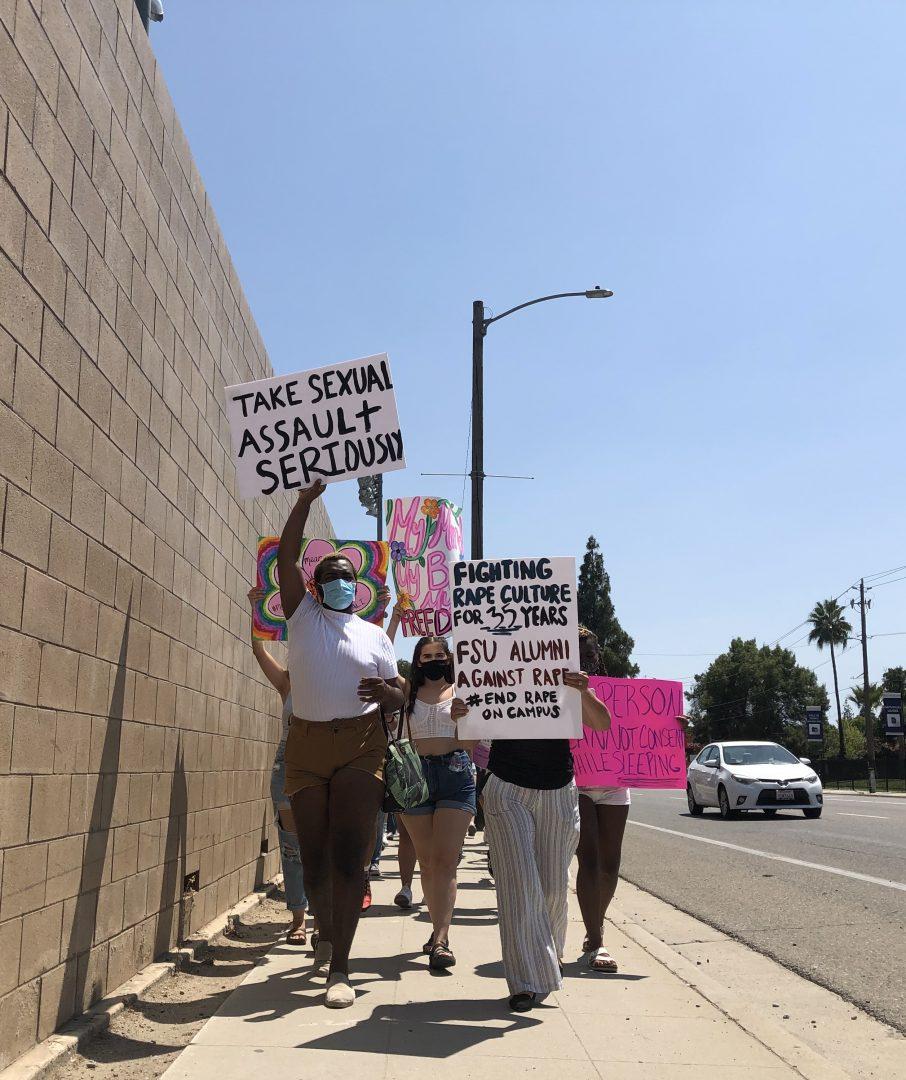Protesters against frat culture march down Cedar Avenue on their way to Fresno States fraternity row in support of sexual assault victims on Monday, August 3, 2020. (Andrea Marin-Contreras/The Collegian) 