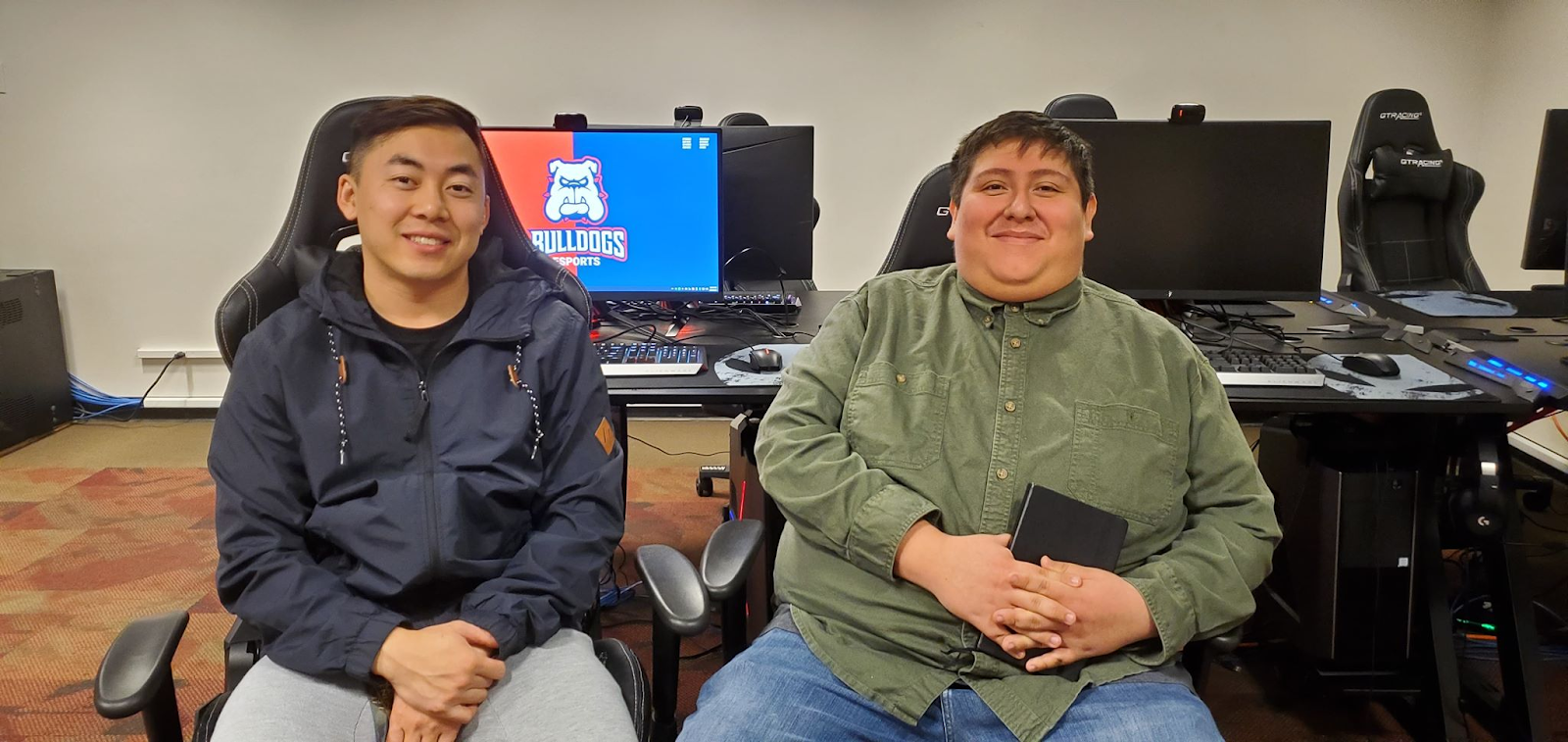 Tommy Cherta Lee  (left) and Alan Gurrola (right) sit inside the eSports Areana in the USU on Monday, February 24, 2020. (Galcy Lee/The Collegian)