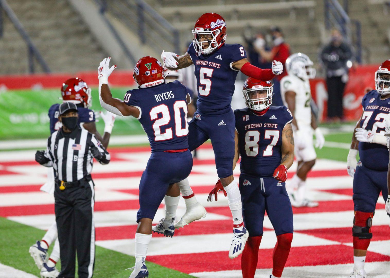 Fresno State’s running back Ronnie Rivers celebrates with his teammates after the first touchdown during the first quarter of the game against Colorado State Rams on Oct. 30, 2020, at Bulldog Stadium. (Vendila Yang/The Collegian) 