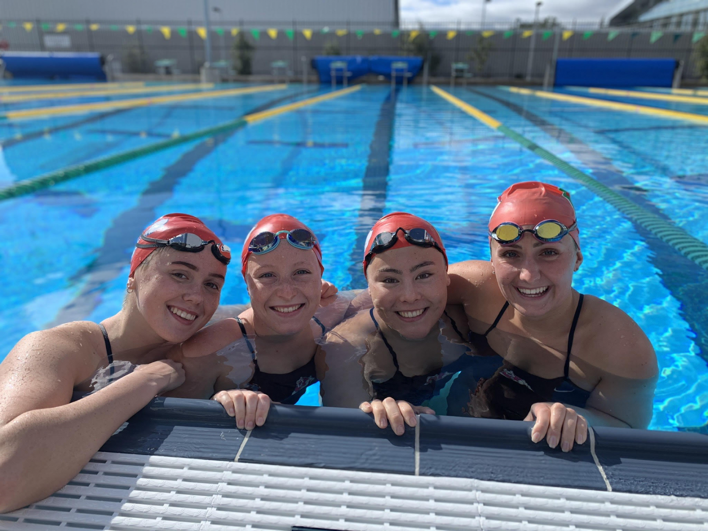 From left to right: EydÃ­s KolbeinsdottÃ­r, Emileigh Stock, Athena Clayson and Lucy Davies pose for a photo while competing against the Cal Poly Mustangs on Jan. 11, 2020. (Credit: Anthony Randall) 