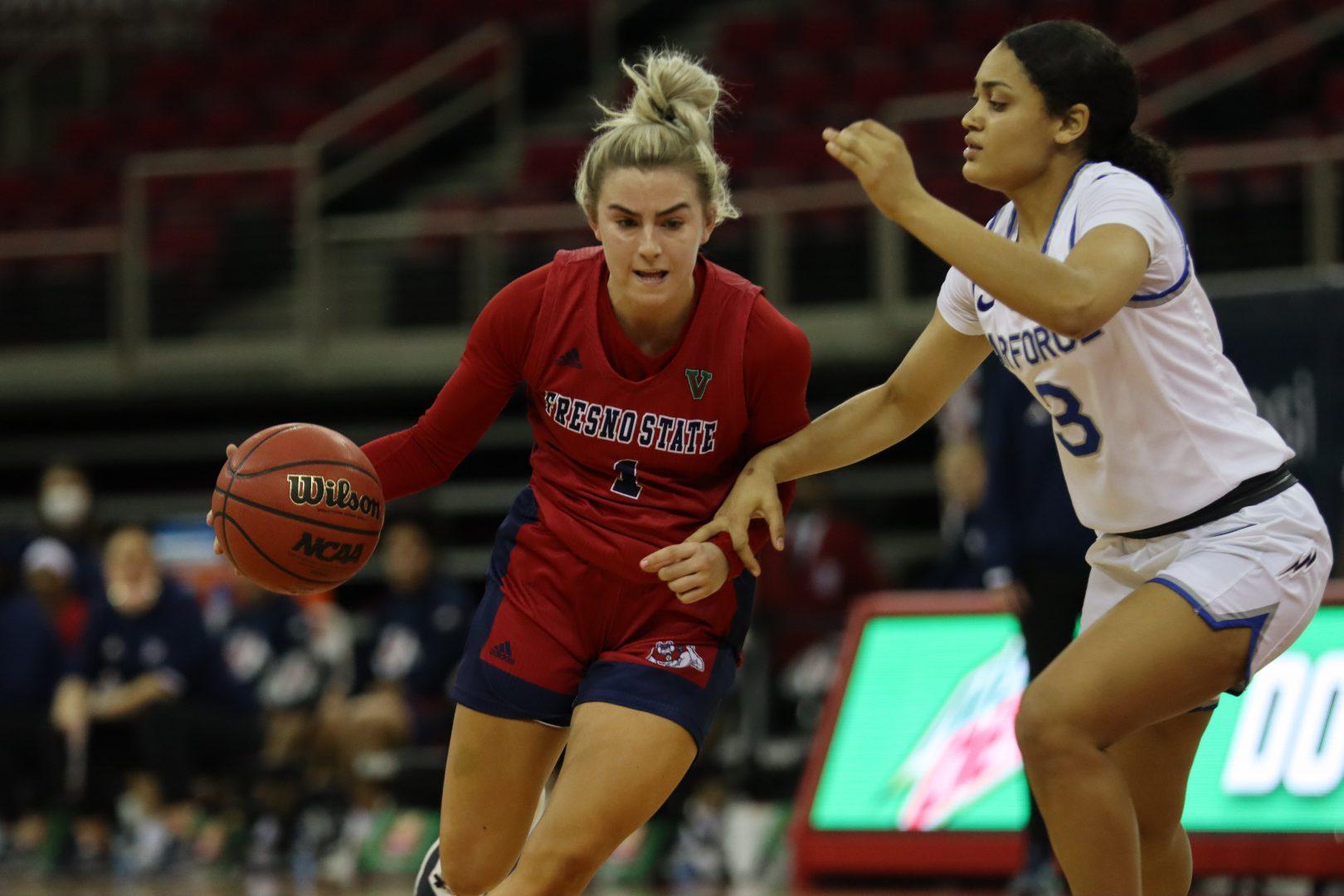 Fresno State guard Haley Cavinder (1) drives the ball to the basket in the first half of  the game against Air Force on Feb. 11, 2021, at the Save Mart Center. (Kameron Thorn / The Collegian)