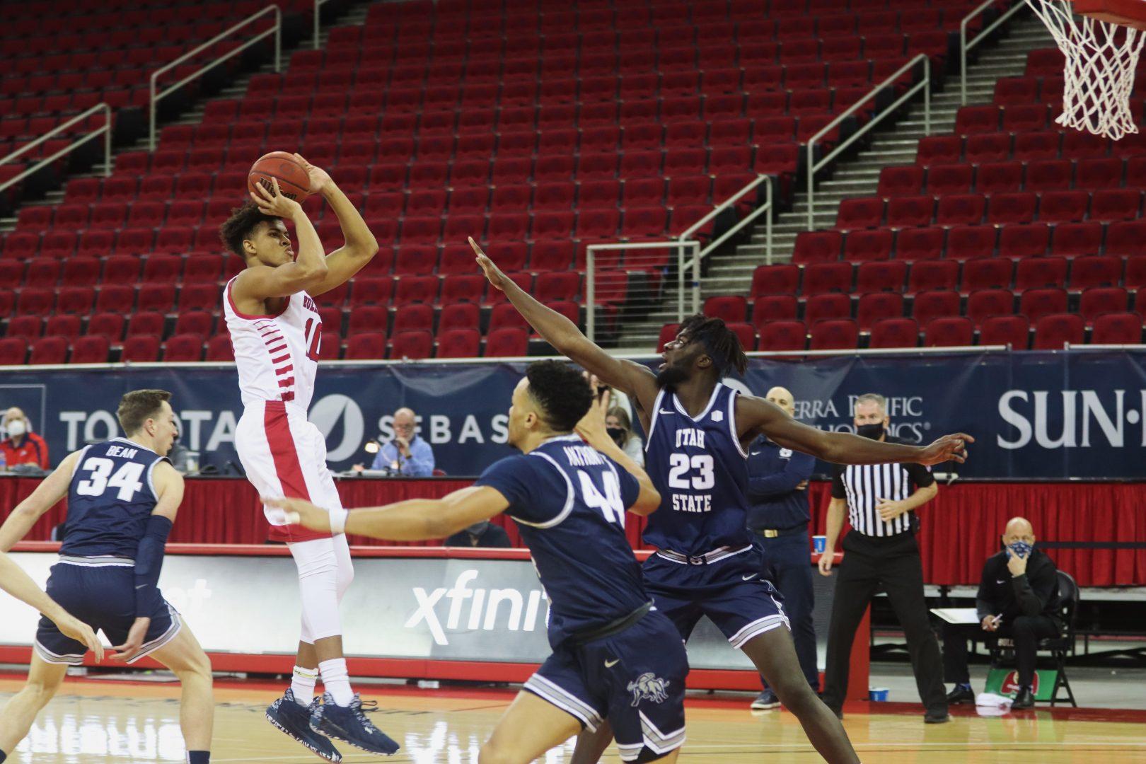 Fresno State forward Orlando Robinson pulls up for a two-pointer in the first half of its game against Utah State at the Save Mart Center on Thursday, Feb. 4, 2021. (Kameron Thorn/The Collegian)