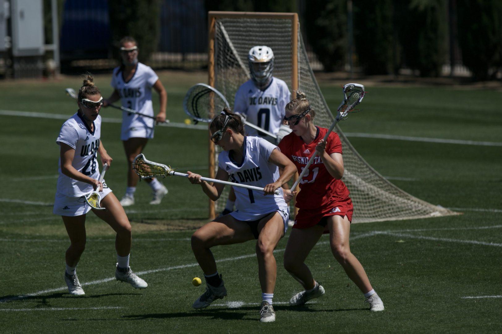 Fresno States Logann Eldredge battles for posession of the ball against UC Davis in the Mountain Pacific Sports Federation championship game on Saturday, May 1, 2021. (Gabe Camarillo/The Collegian) 