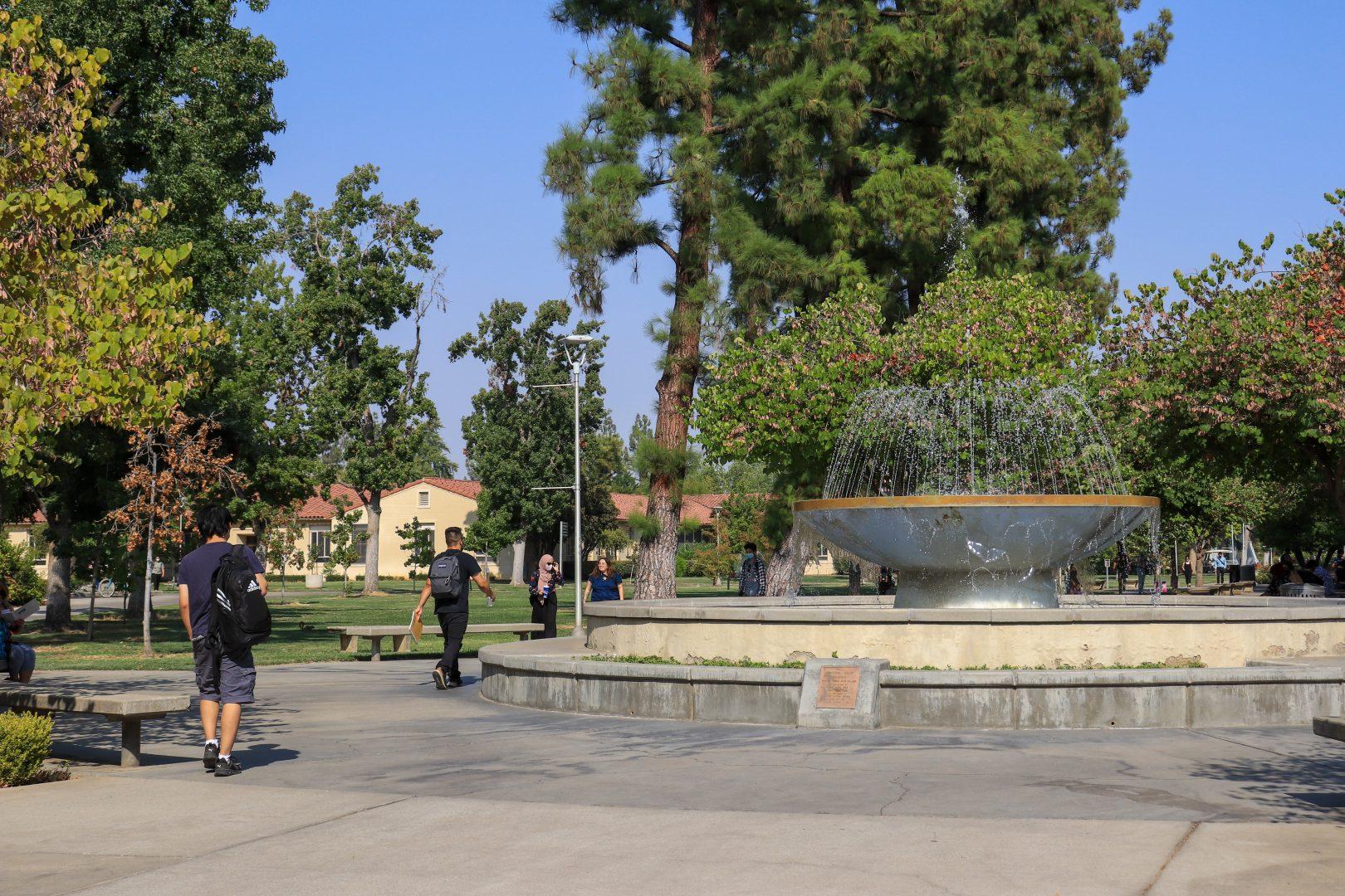 Students can walk east past the campus fountain toward the Joyal Administration Building for resources like the Dream Success Center and Educational Opportunity Program. 