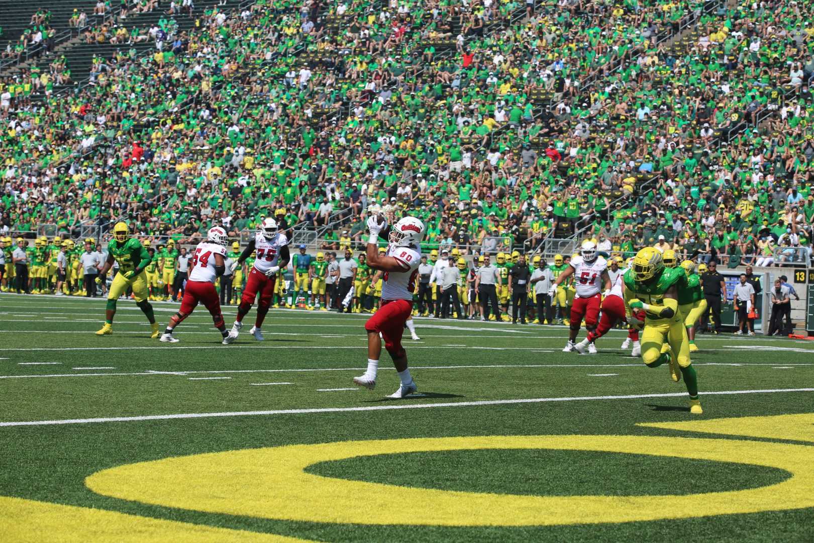 Juan Rodriguez catches a pass from quarterback Jake Haener for a 2-point conversion in the third quarter against the Oregon Ducks at Autzen Stadium on Saturday, September 4, 2021. (Tyler Van Dyke/The Collegian)