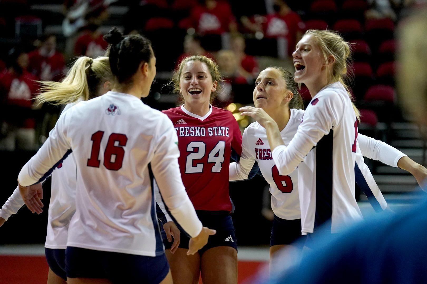 Fresno+State+volleyball+team+celebrates+victory+against+Colorado+State+on+Thursday%2C+Sept.+30%2C+2021%2C+at+the+Save+Mart+Center.+%28Courtesy+of+Fresno+State+Athletics%29