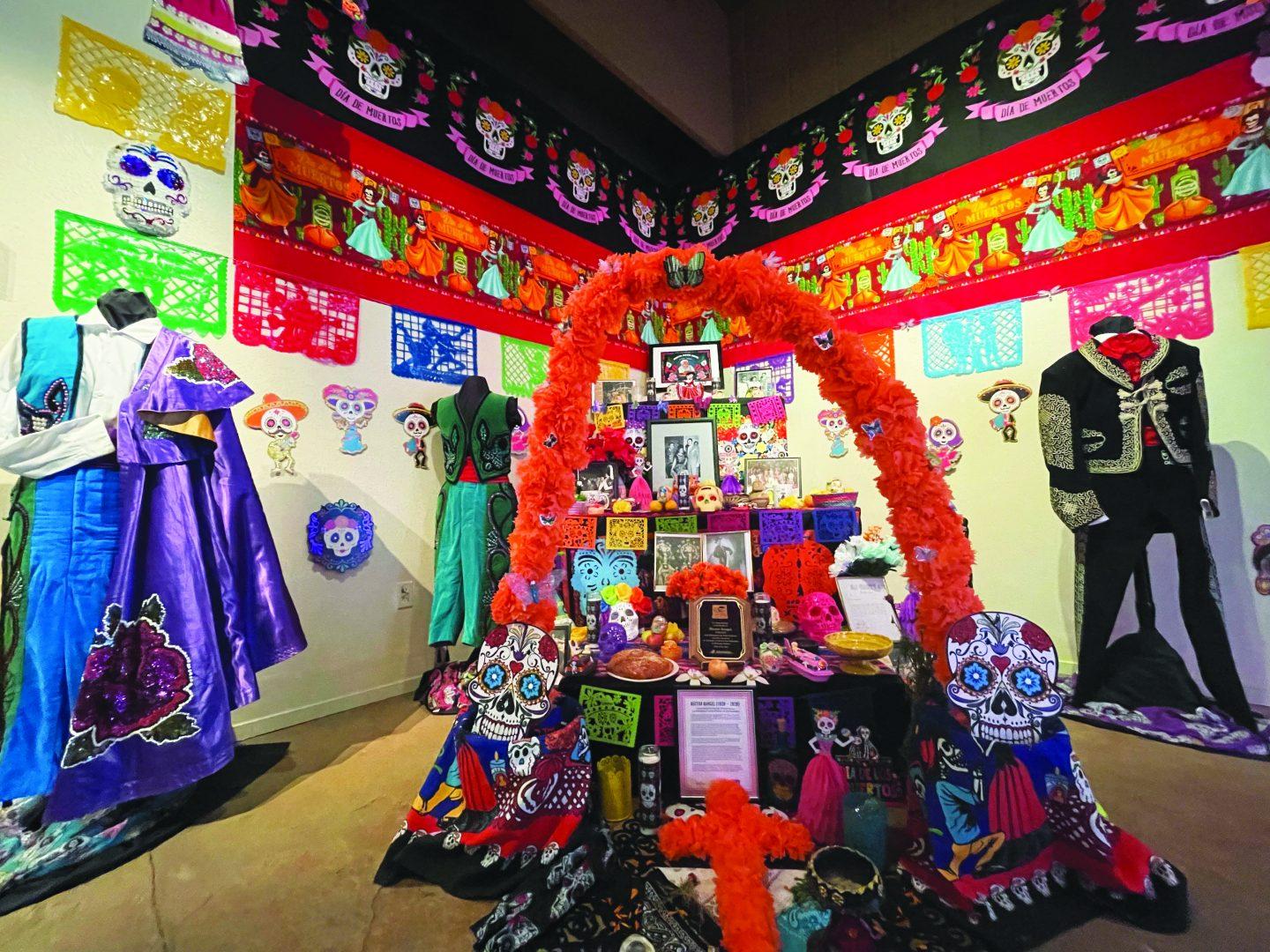 One of the colorful ofrendas celebrates the late folklorico dancer Hector Rangel. (Ashley Flowers/The Collegian)