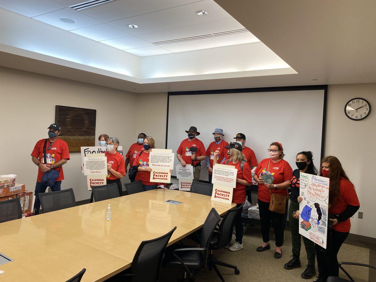 The Fresno chapter of the California Faculty Association (CFA) met with President SaÃºl JimÃ©nez-Sandoval, demanding that he support faculty efforts to obtain fair contract. The CFA and the CSU are currently at an impasse in the bargaining process. (Adam Ricardo Solis/The Collegian)