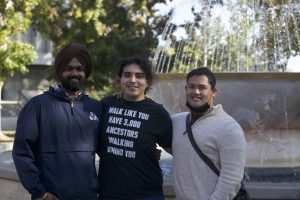 Harjot Singh, left, Paul Areyan, center, and Joe Martinez Jr., right, pose for a portrait in front of the university fountain. The veteran students will graduate this fall from the nursing program. (Adam Ricardo Solis/The Collegian)