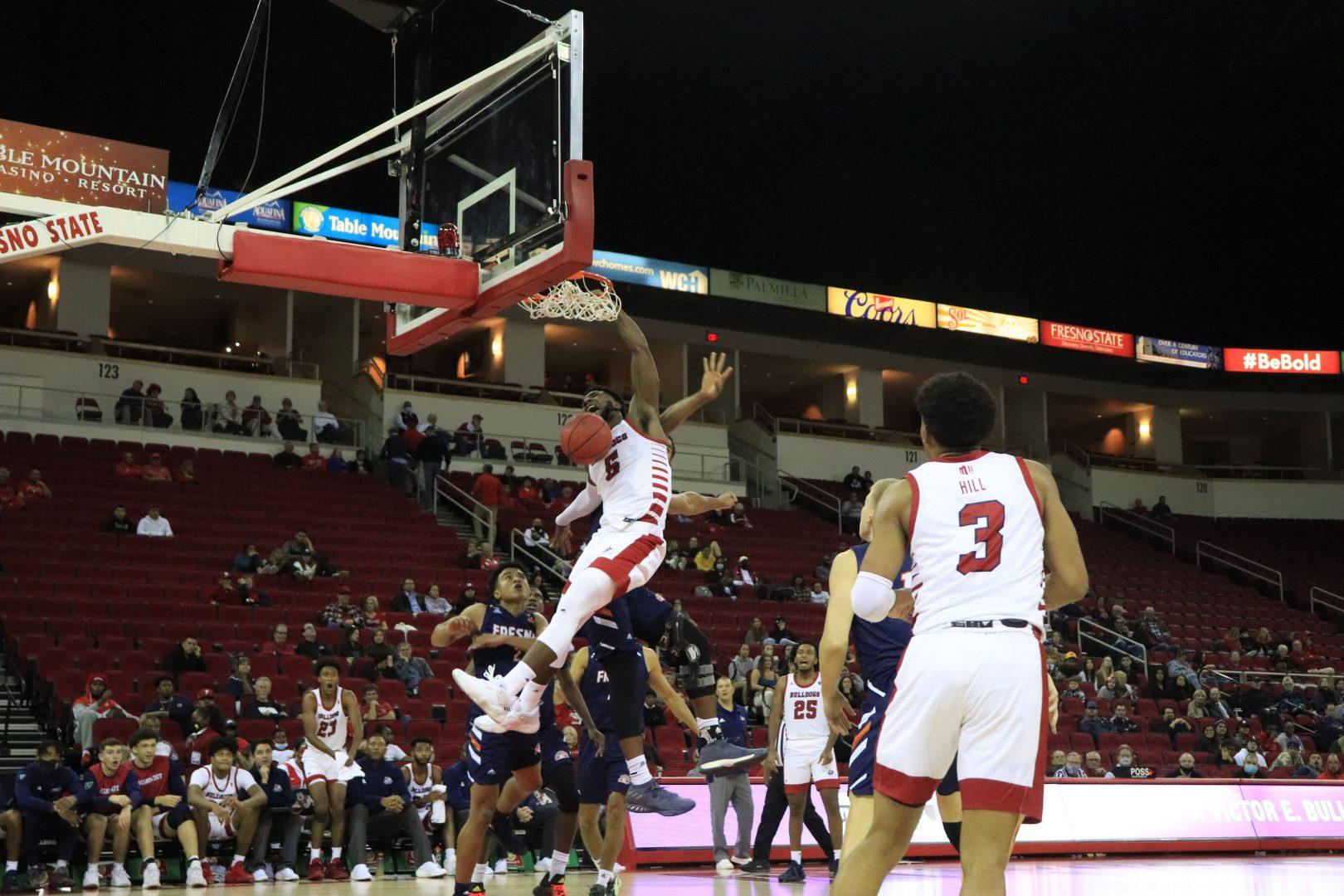 Fresno State guard Jordan Campbell dunks the ball in the second half against Fresno Pacific on Tuesday, Nov. 9, at Save Mart Center. (Melina Kazanjian/The Collegian)
