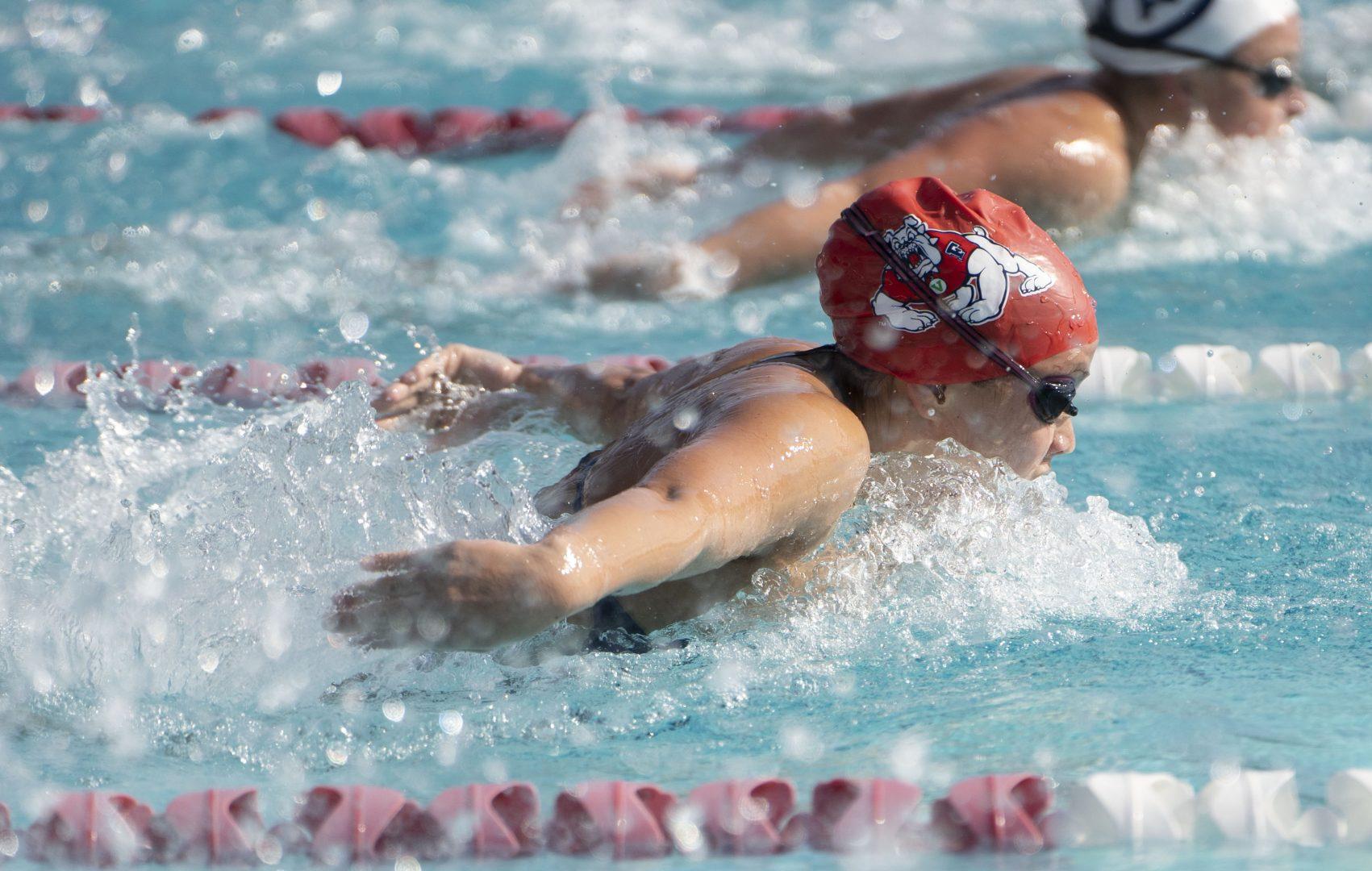 Katie+Ueda+swims+the+200+fly+in+Fresno+State+womens+swimming+and+diving+senior+day+against+UC+Davis+at+the+Fresno+State+Aquatics+center+Saturday+Jan.+22%2C+2022.+%28Wyatt+Bible%2F+The+Collegian%29